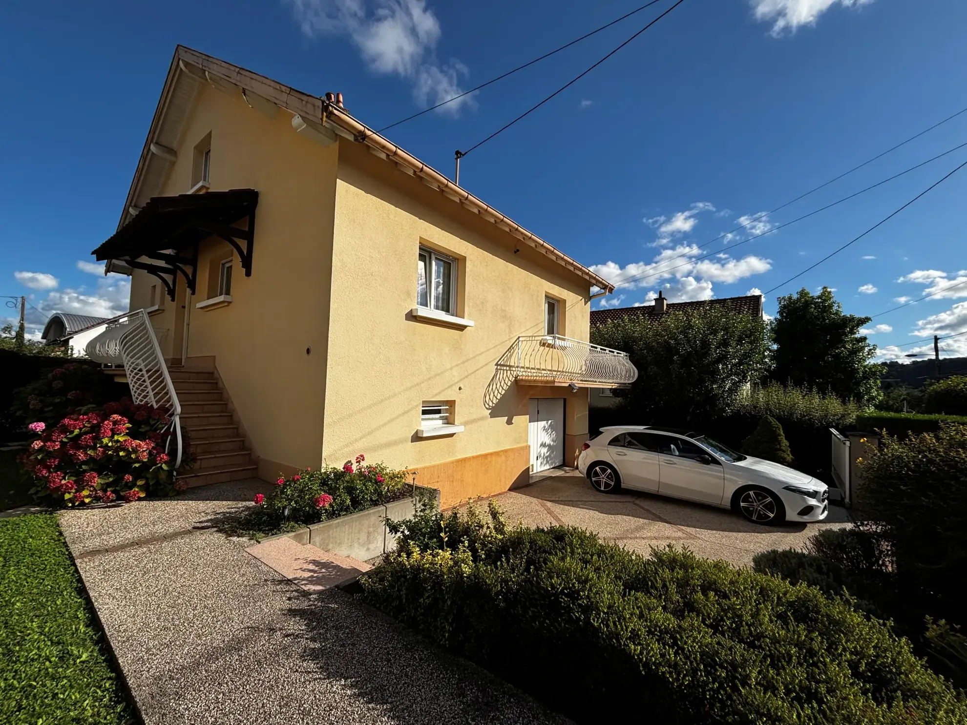 Maison de 116m² à Montbéliard, secteur recherché, avec grand terrain et garage 