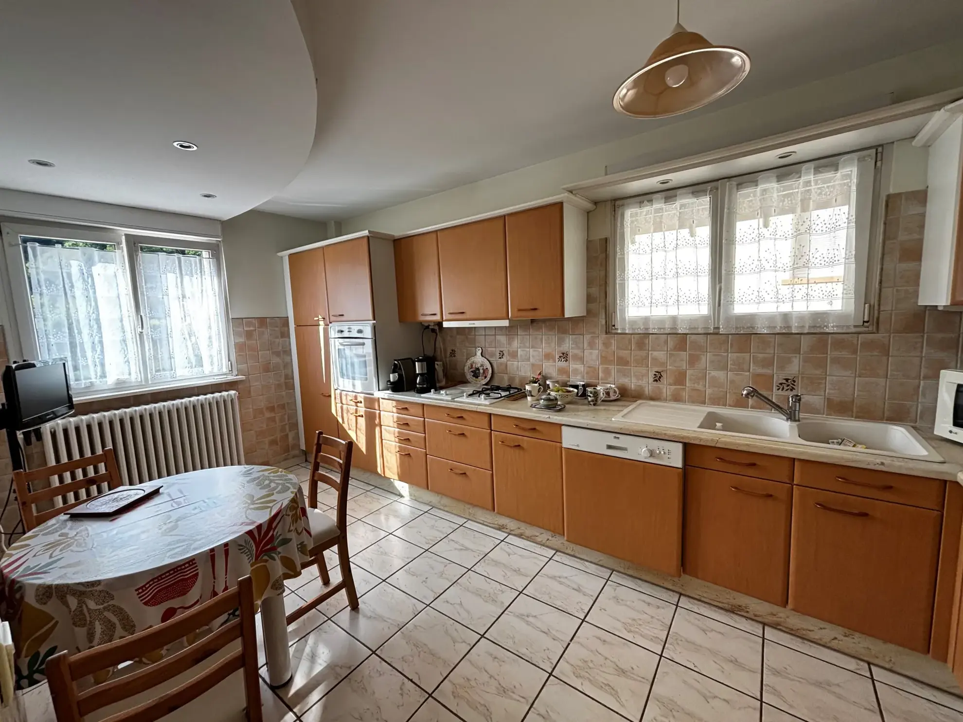 Maison de 116m² à Montbéliard, secteur recherché, avec grand terrain et garage 