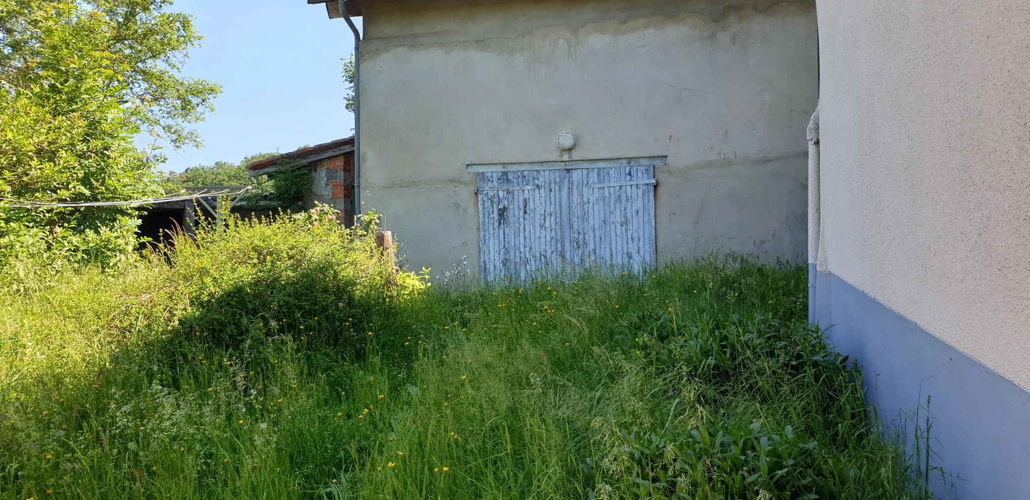Charmante ferme en L avec potentiel à Sainte-Foy-l'Argentière 