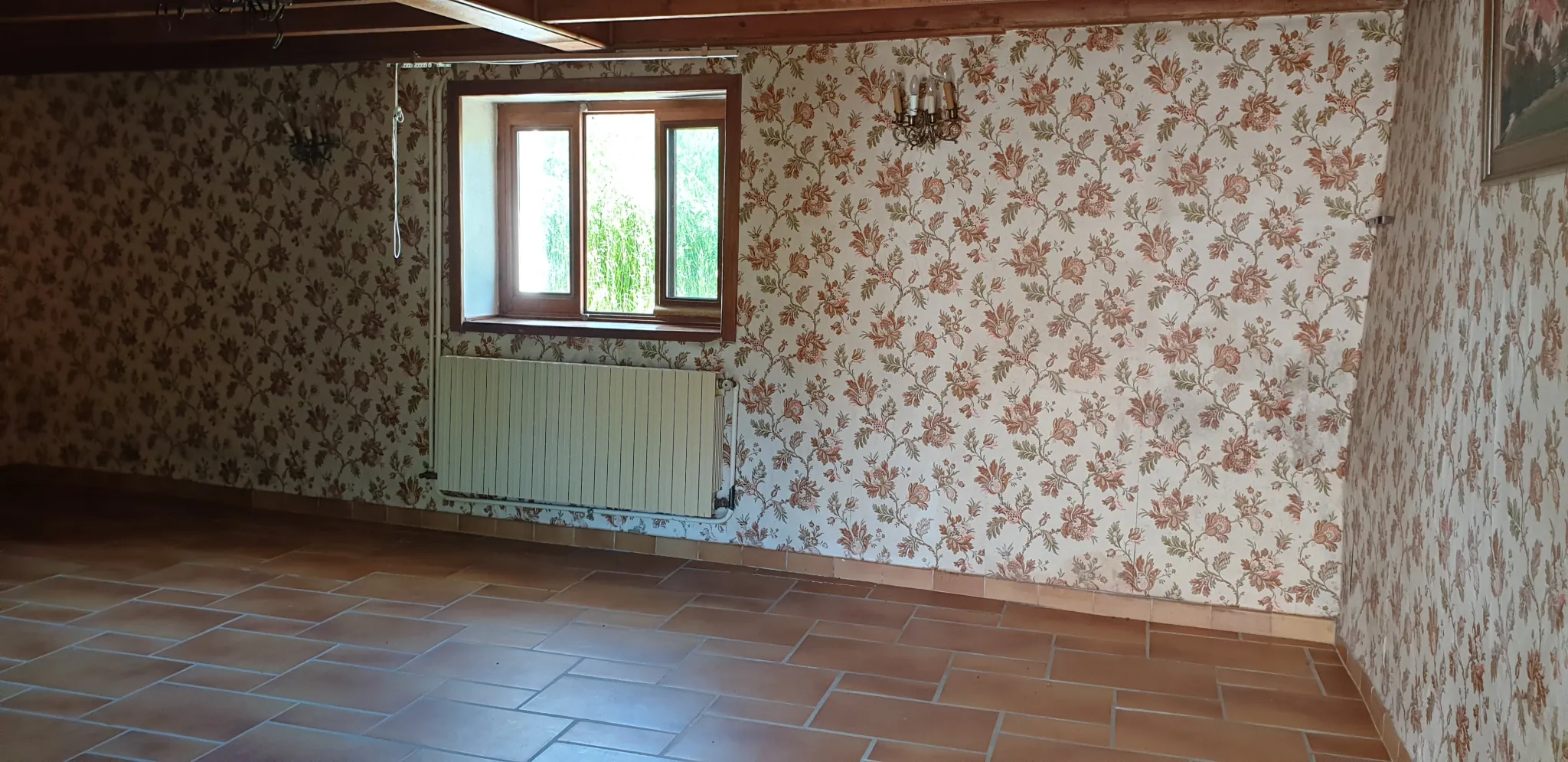 Charmante ferme en L avec potentiel à Sainte-Foy-l'Argentière 