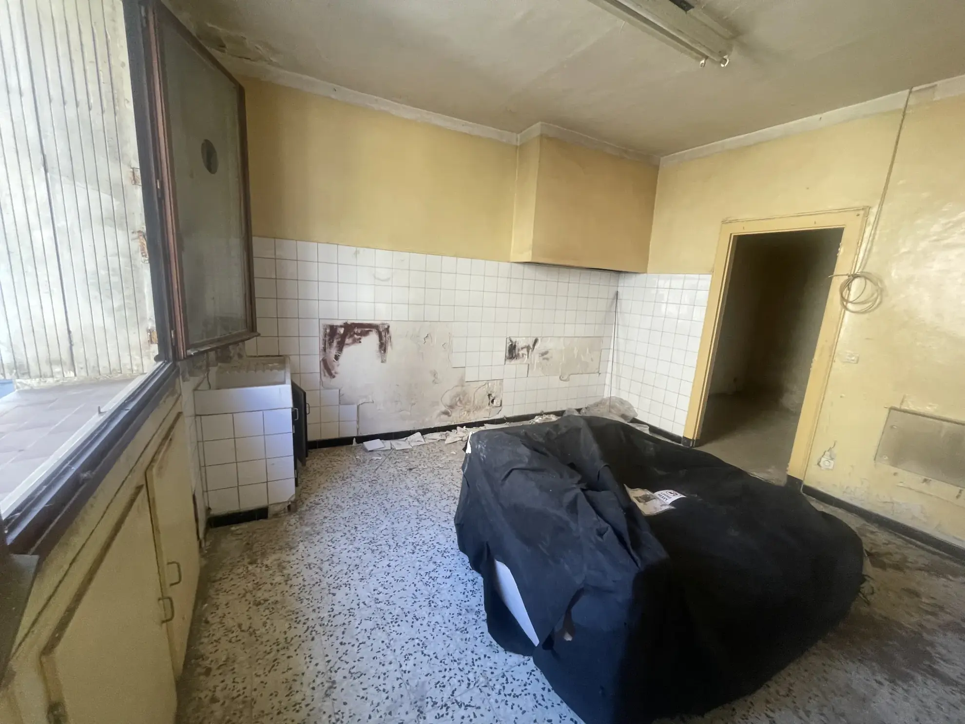 Appartement à rénover dans le quartier haut de Sète – potentiel patrimonial