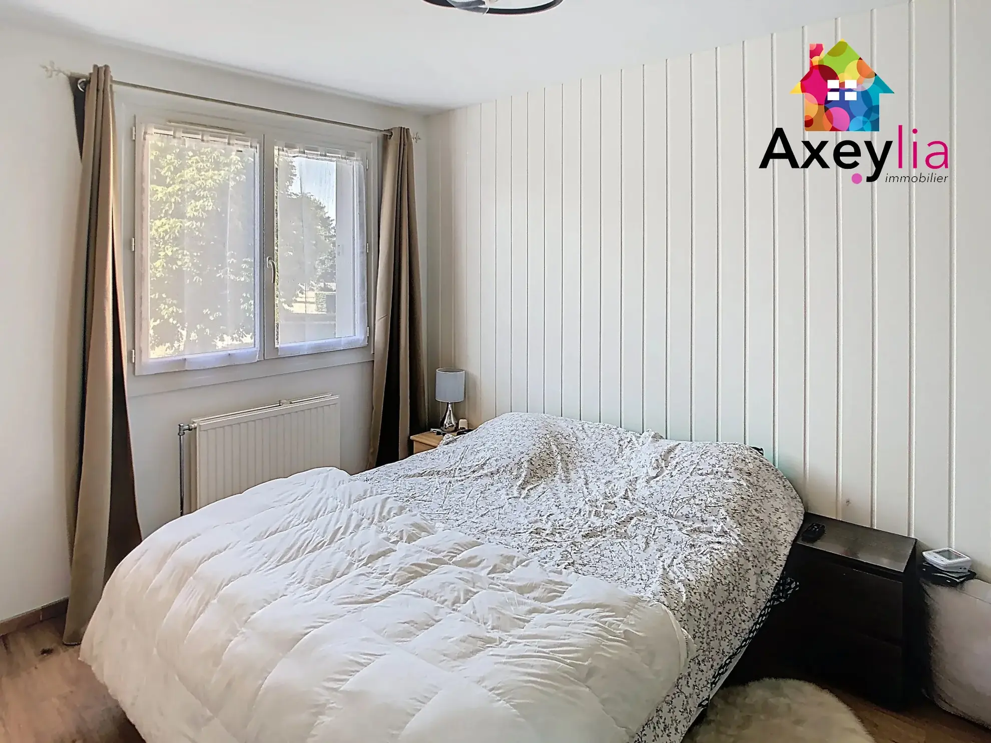 Appartement T5 rénové à Riorges avec terrasse, cave et 3 chambres 