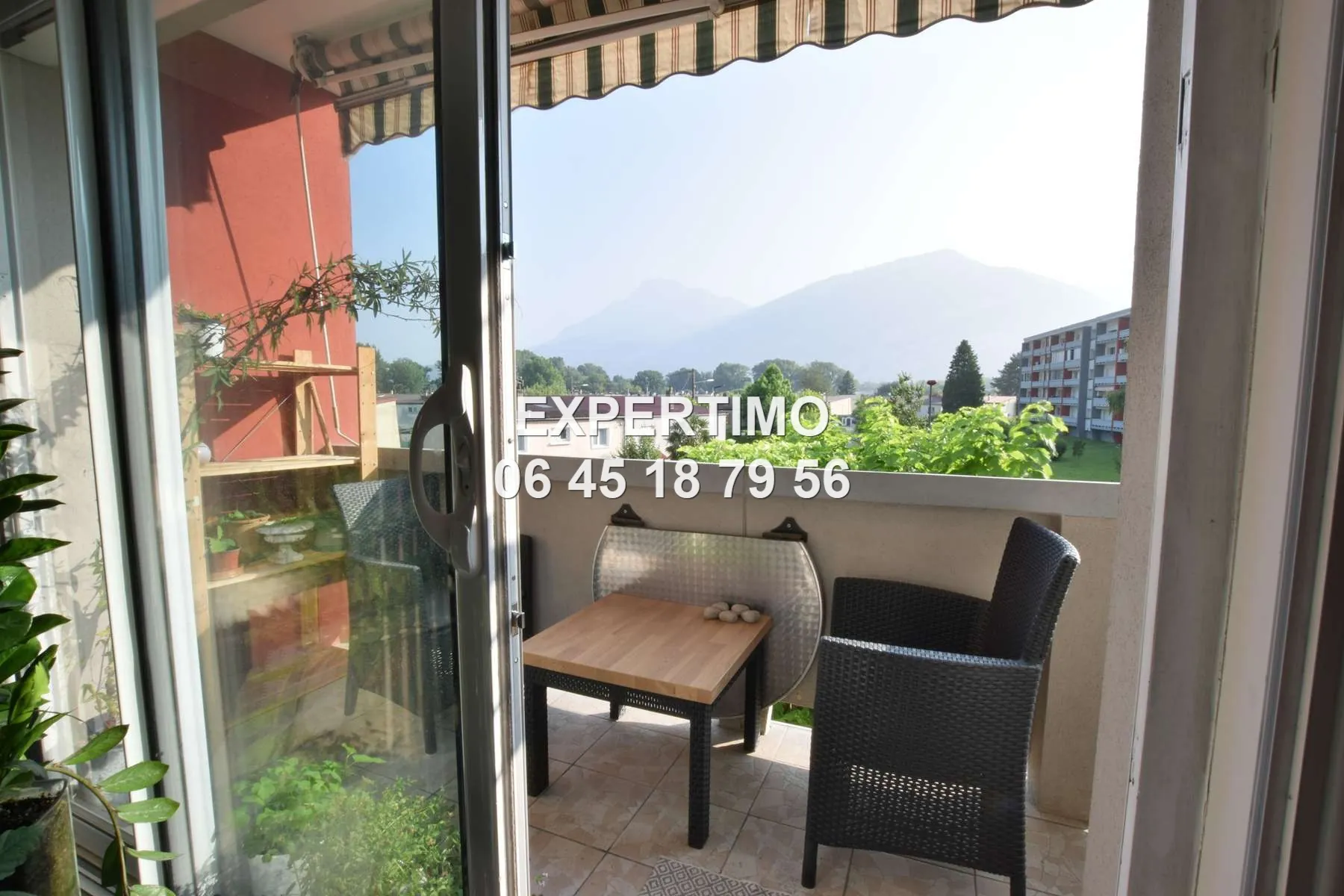 Appartement T4 avec balcon, cave et stationnement à Saint-Égrève