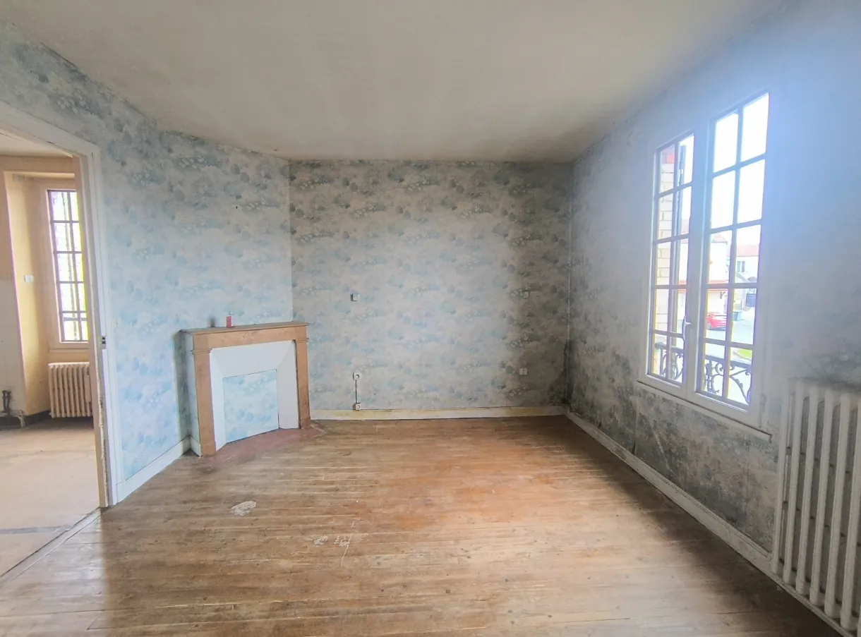 Maison à Château-Thierry avec grand potentiel, garage et jardin - À rafraîchir 