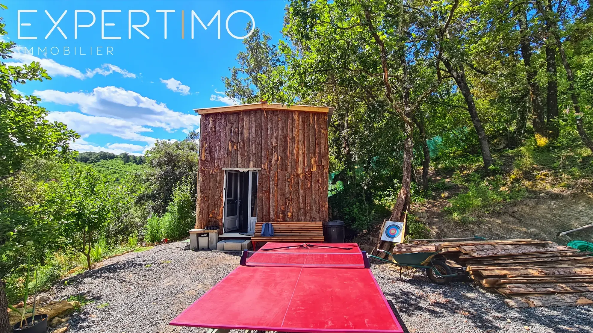 Terrain viabilisé de 1160 m² à Vabres avec permis de construire et chalet en bois 