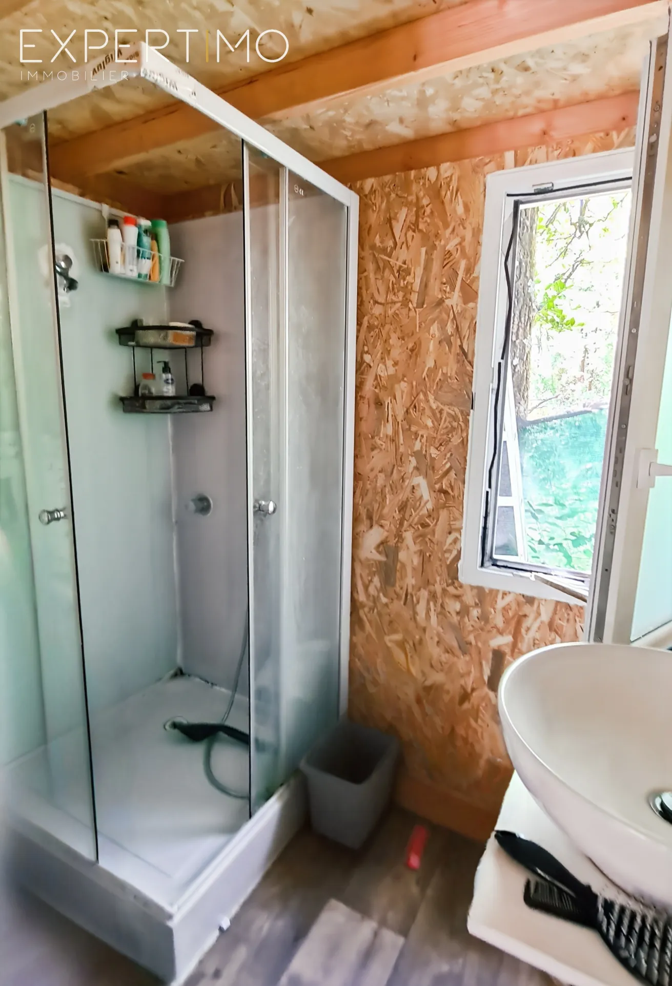 Terrain viabilisé de 1160 m² à Vabres avec permis de construire et chalet en bois 