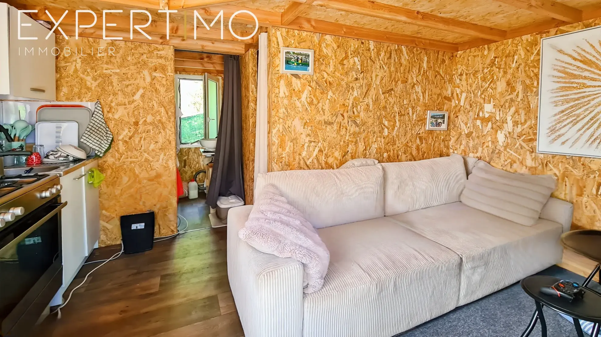 Terrain viabilisé de 1160 m² à Vabres avec permis de construire et chalet en bois 