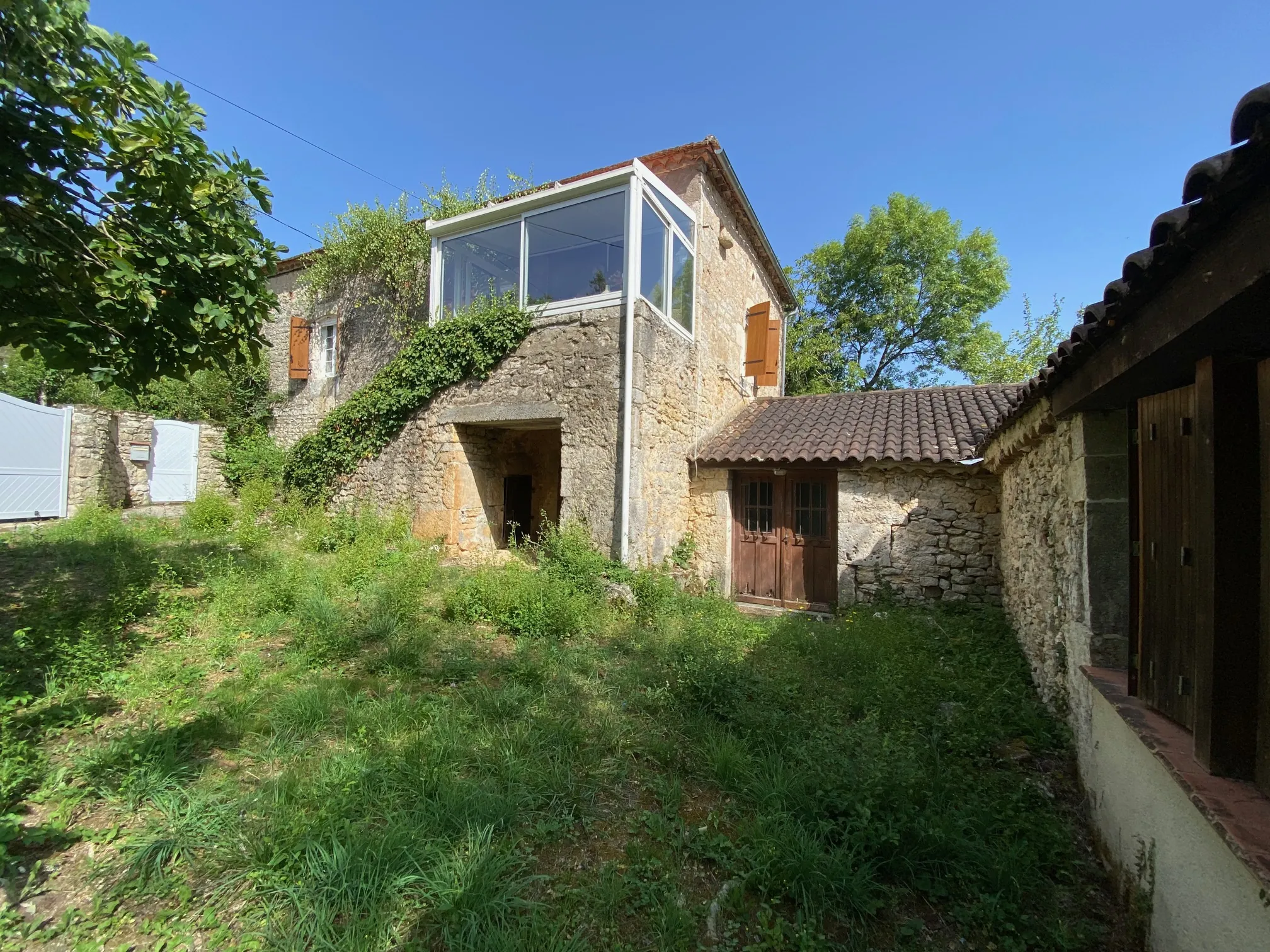 Propriété en Pierre de 130 m² avec 2 Maisons et Terrain en Quercy 