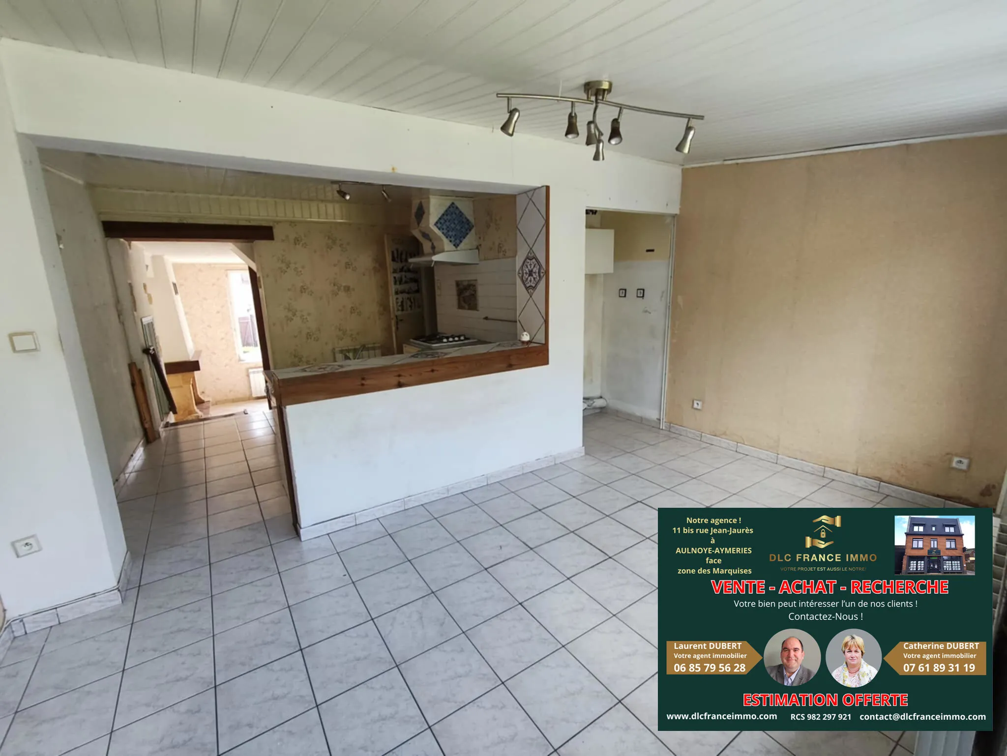 Maison semi-individuelle à Rousies avec garage et terrasse - À rafraîchir 