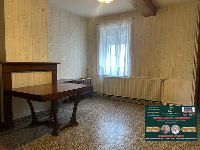 Maison semi-individuelle à vendre à Berlaimont avec grand garage et potentiel élevé 