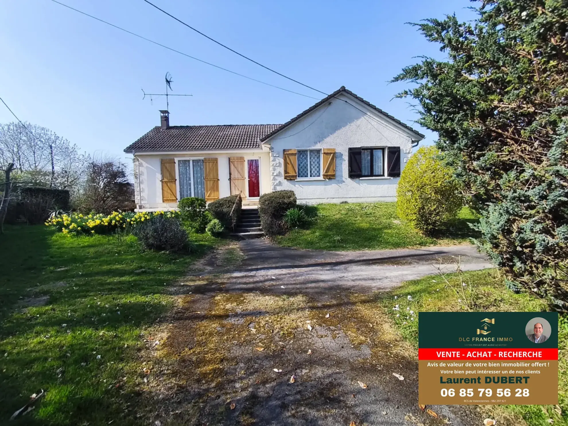 Maison à vendre à Berlaimont - Terrain arboré de 1593 m² avec garage et cave 