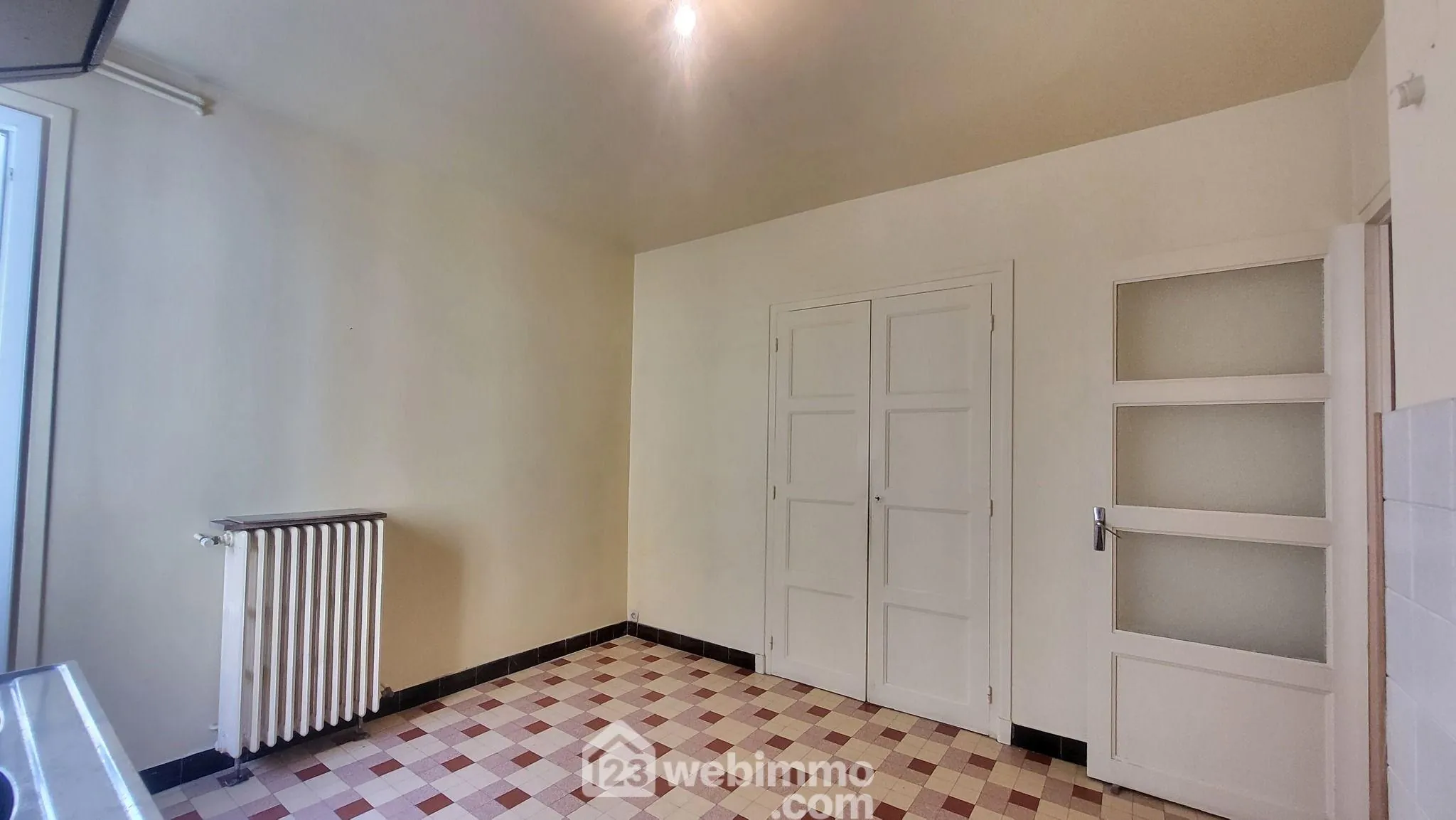 Appartement T3 rénové de 74 m² à Grenoble proche tramway et commerces 