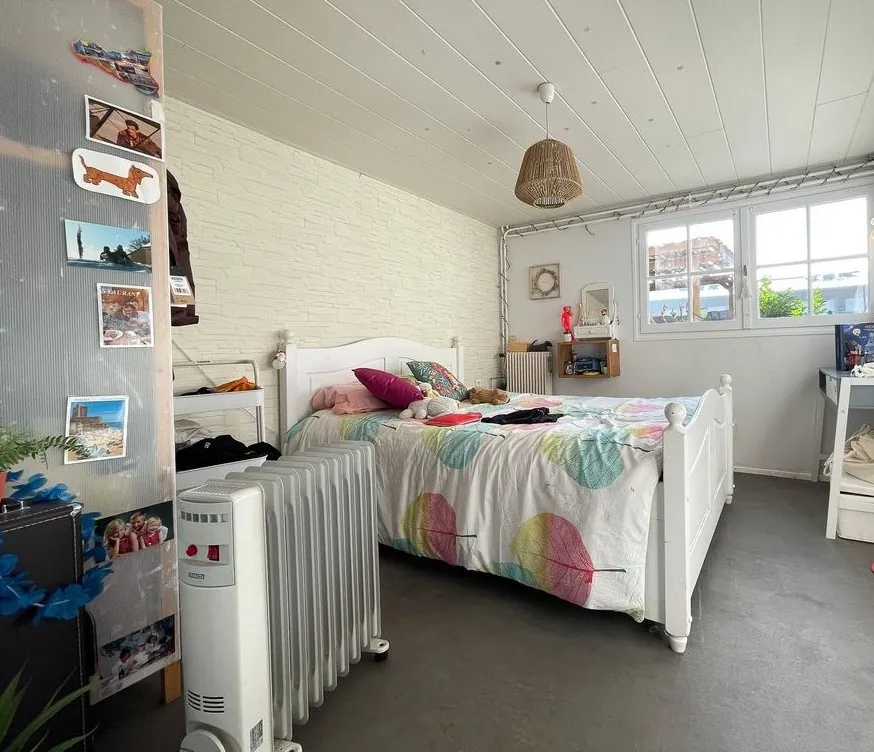 Maison à vendre dans le quartier Danton à Brive la Gaillarde - 4 chambres, garage et terrain arboré 