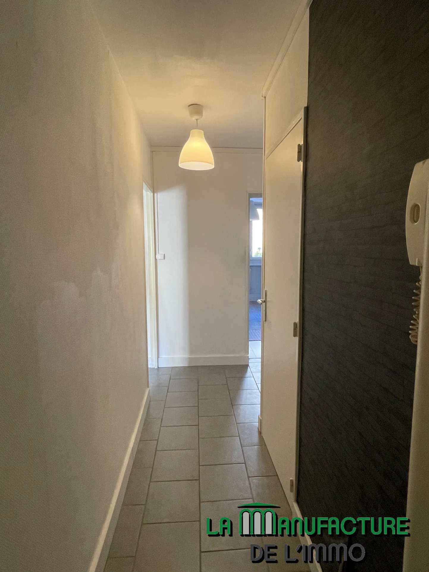 Appartement F3 à Saint-Étienne avec balcon et cave - Opportunité d'investissement 