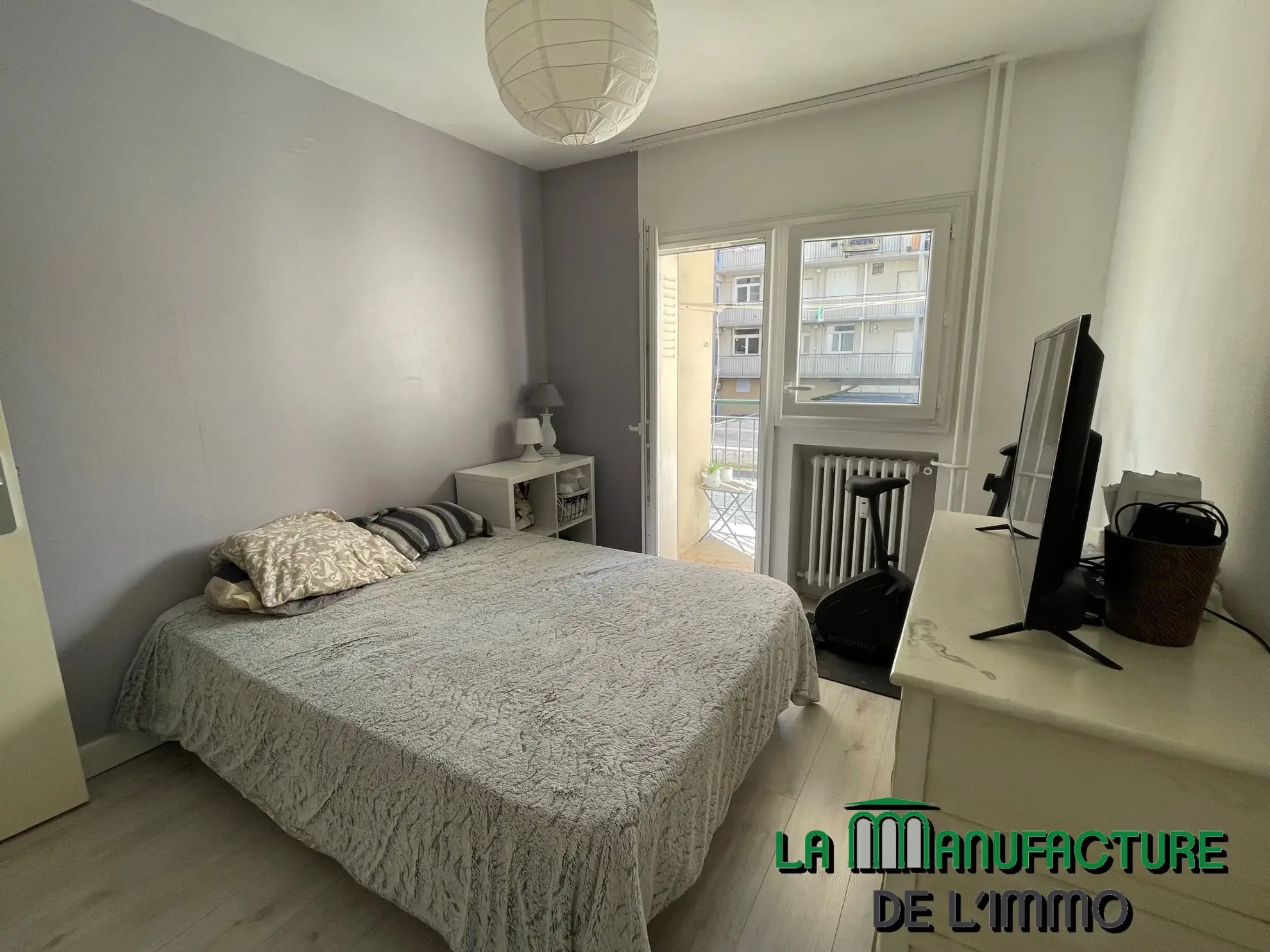 Appartement F3 à Saint-Étienne avec balcon et cave - Opportunité d'investissement 