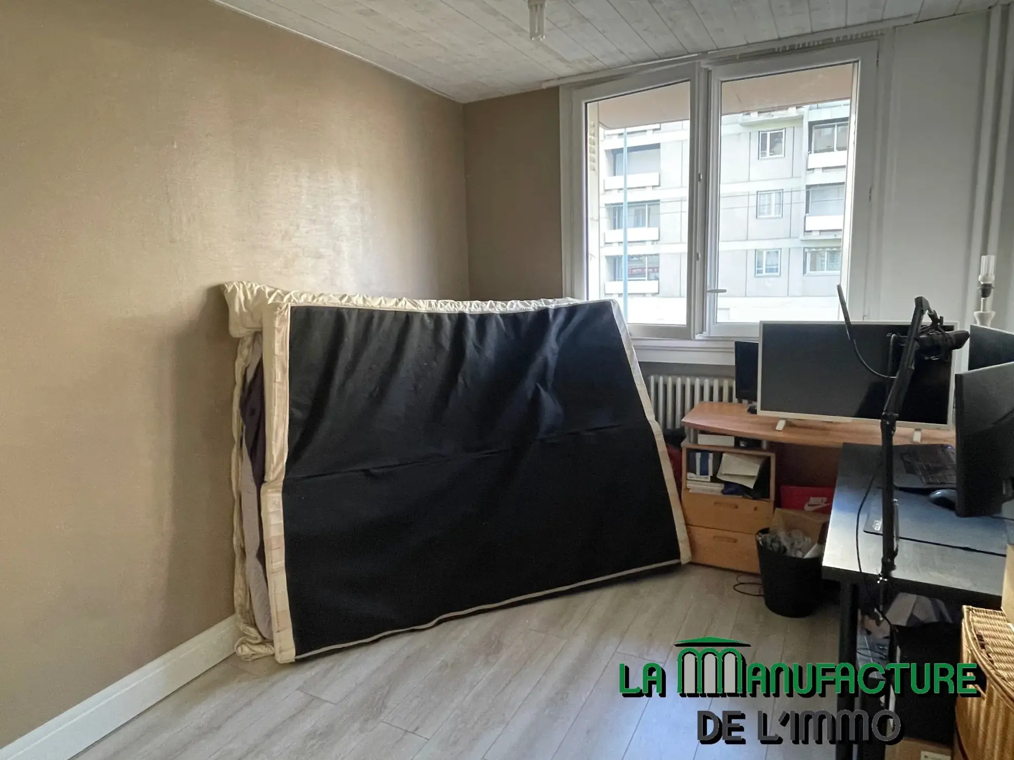 Appartement F3 à Saint-Étienne avec balcon et cave - Opportunité d'investissement 