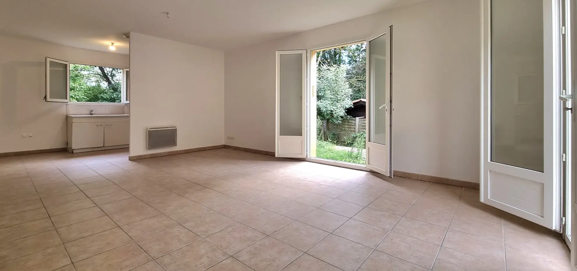 A vendre maison de plain-pied avec jardin à Le Grand Serre 