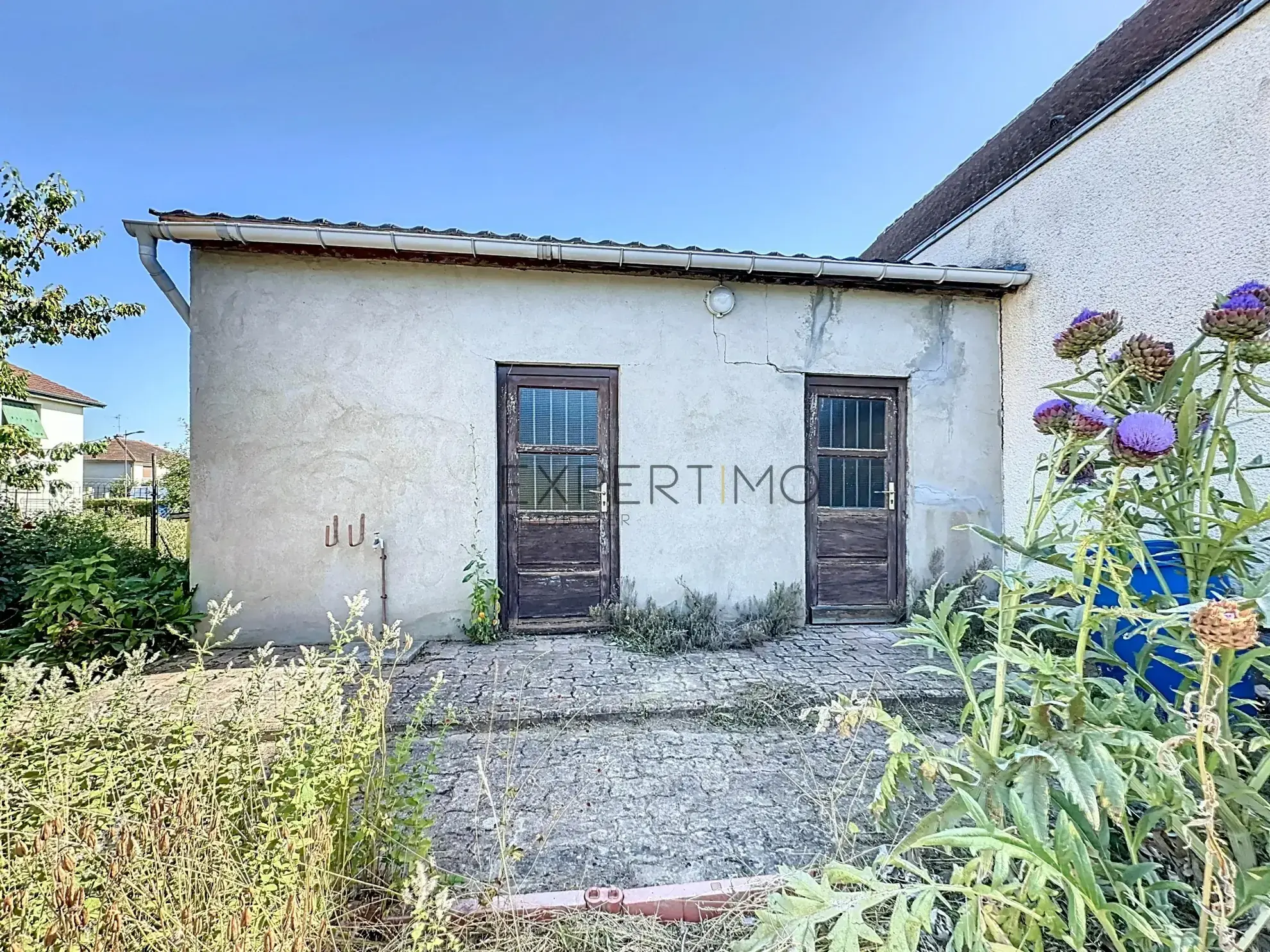 Maison familiale avec jardin en vente à Châtenoy-le-Royal, idéale pour famille, proche écoles et commerces 