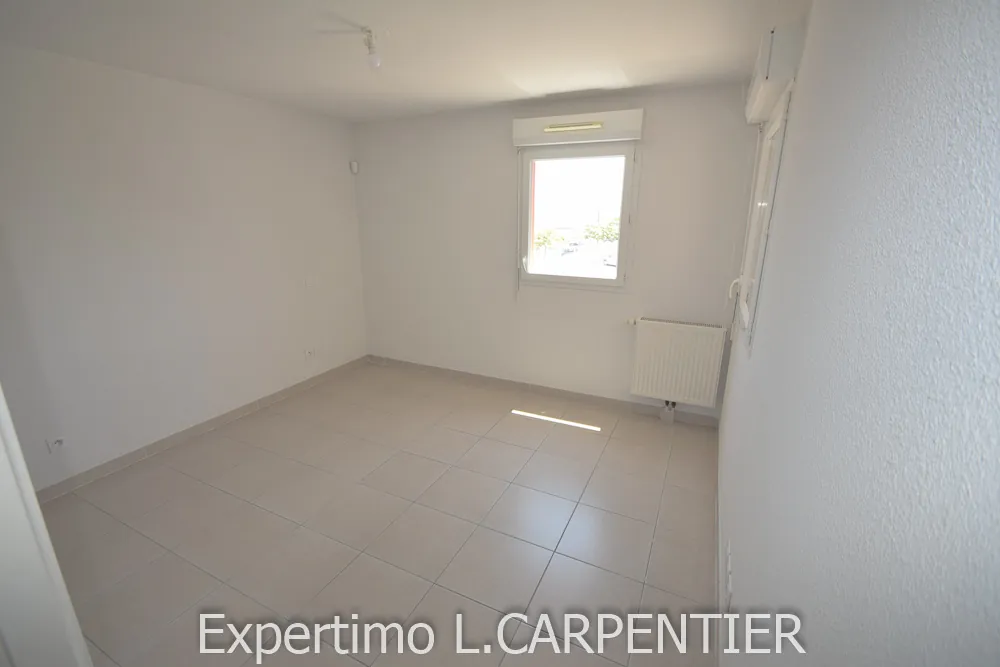 Appartement T2 à Frontignan avec terrasse et parking privé - Résidence sécurisée 