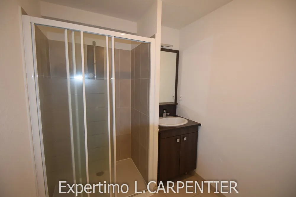 Appartement T2 à Frontignan avec terrasse et parking privé - Résidence sécurisée 