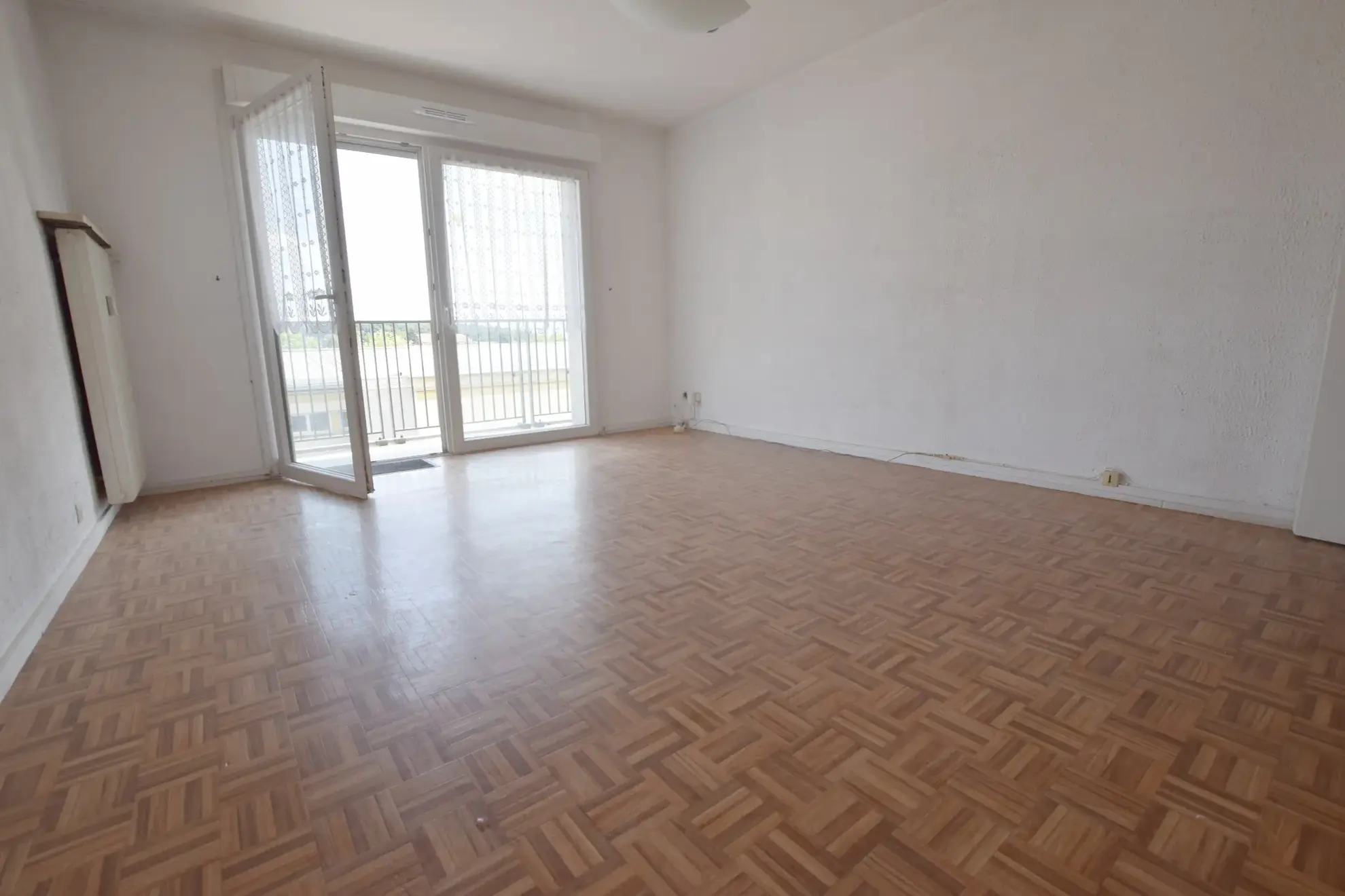 Appartement F3 avec balcon et vue dégagée à Bethoncourt - Montbéliard 