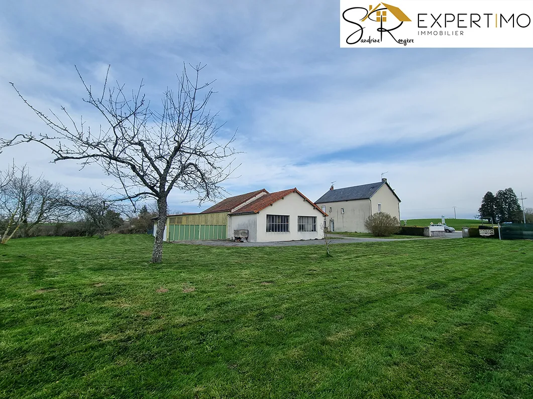 Maison avec 2 appartements, dépendances et grand terrain à Saint-Éloy-les-Mines