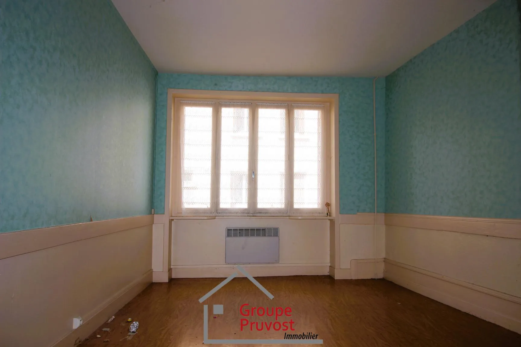 Maison avec deux appartements à Tramayes – Potentiel d'investissement ou première habitation 