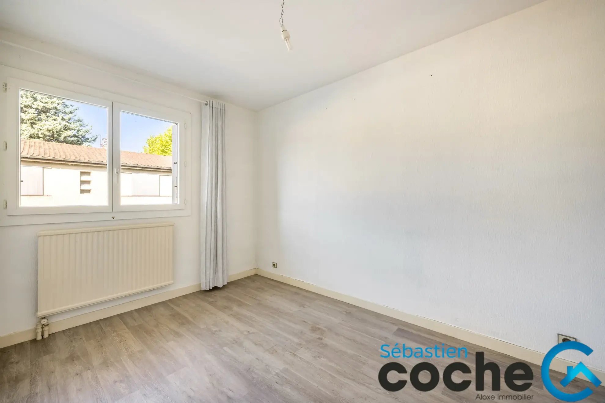 Maison à Vénissieux de 126 m² avec garage et jardin clos 