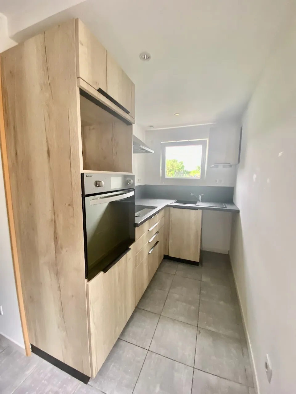 Maison semi-individuelle à Feignies – idéal premier achat avec terrain et espace 