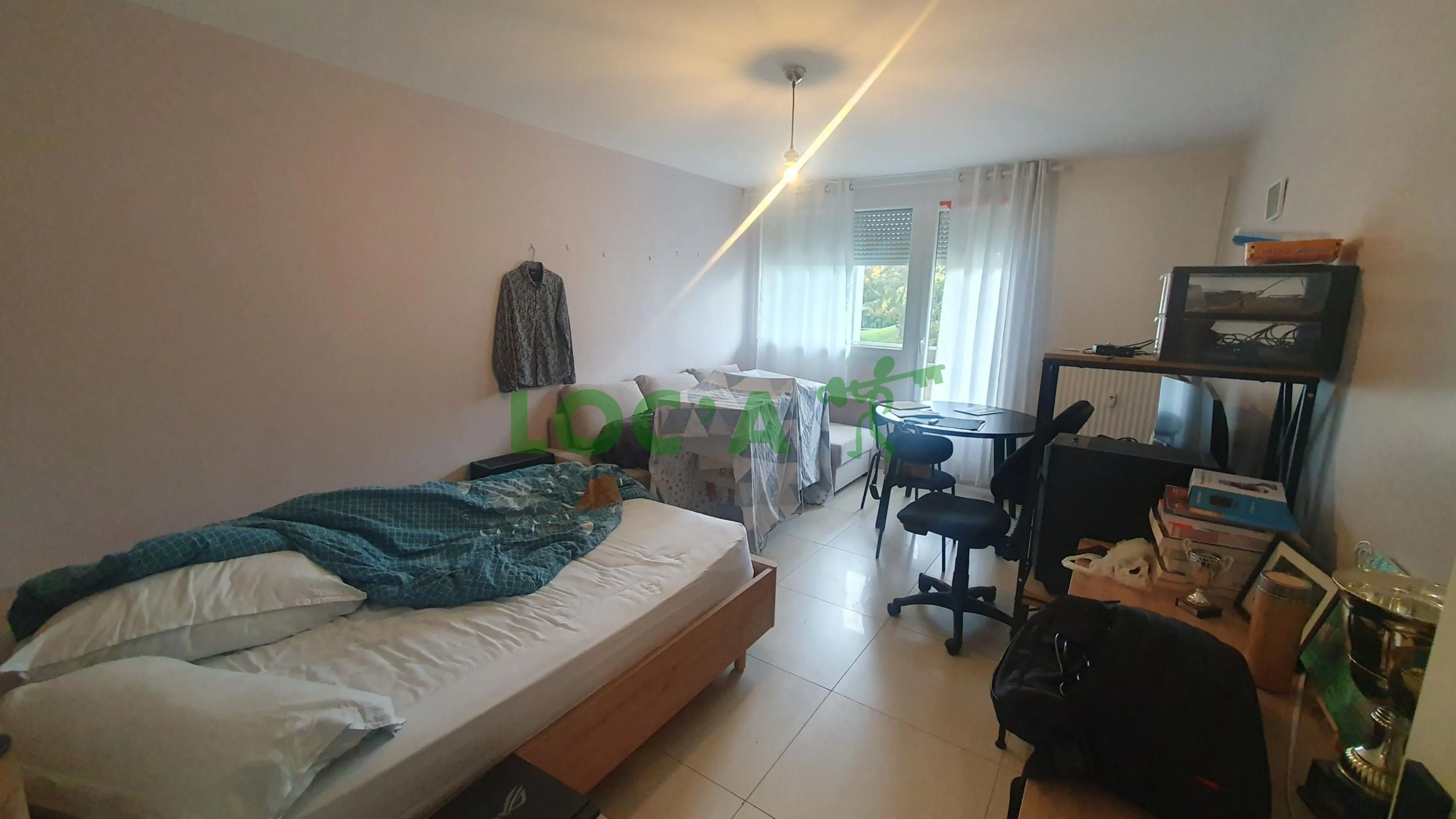 Appartement F1 rénové de 39 m² à Longvic avec balcon et parking 