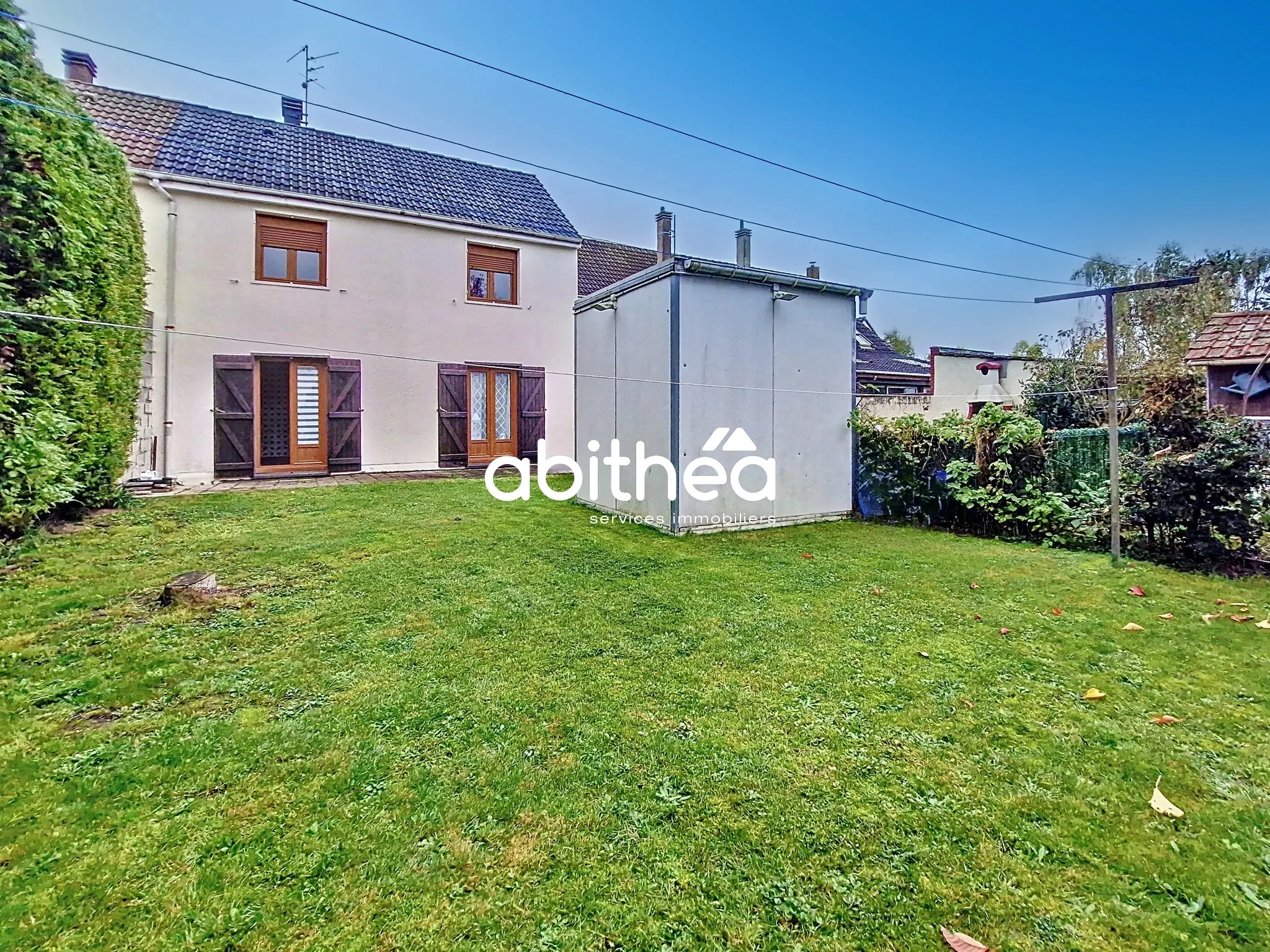 Maison mitoyenne 3 chambres avec garage et jardin à Haisnes 