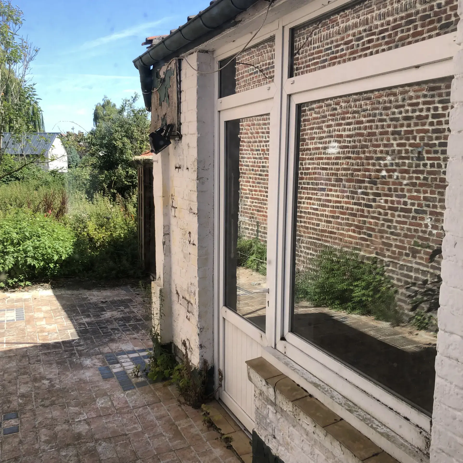 Maison de ville à Sin le Noble à rénover avec jardin et cave 