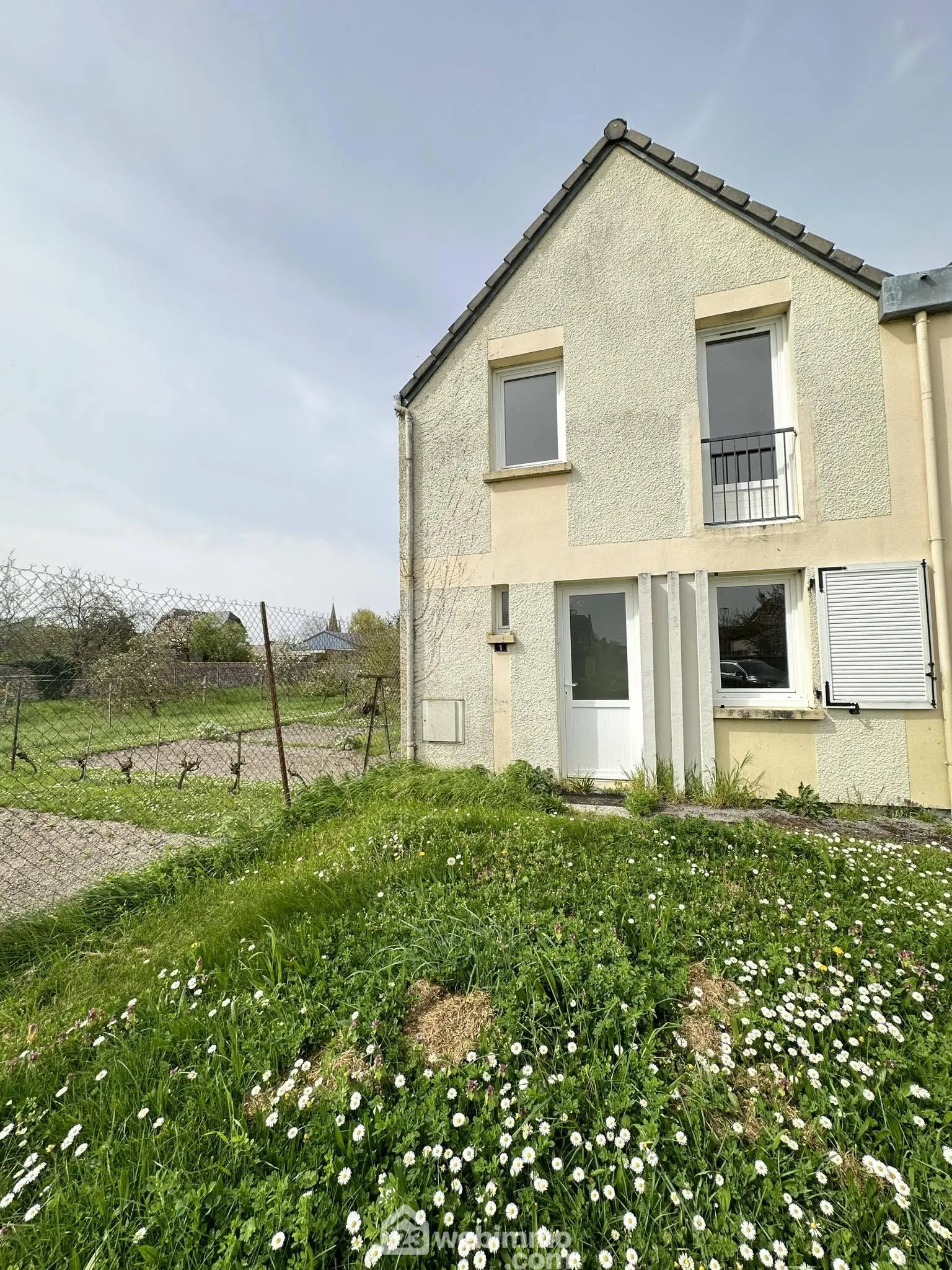 Investissement immobilier à Sissonne : maison louée de 71 m² avec jardin et stationnement