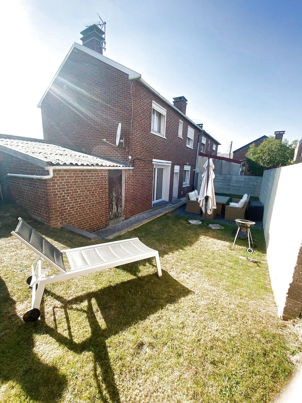 Maison semi-individuelle moderne à Boussois avec 4 chambres, jardin et garage 