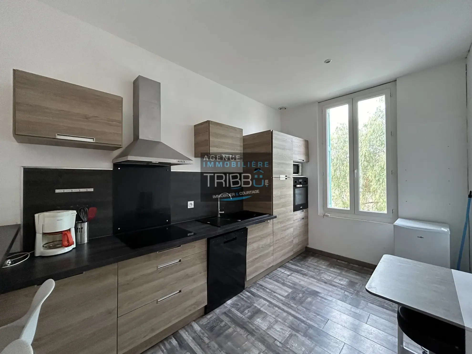 Maison de village de 59 m² avec grand garage et terrasses à Saint-Féliu-d'Avall