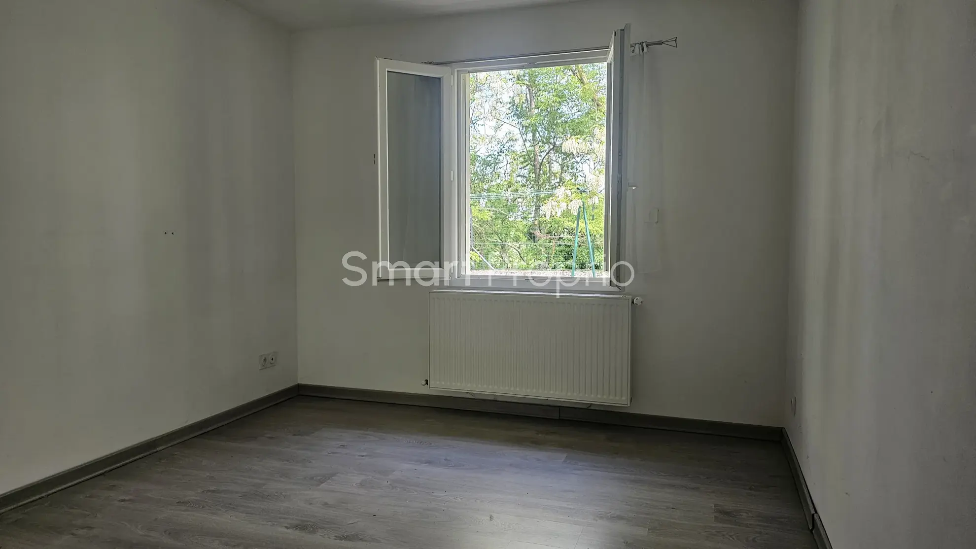 Maison de plain-pied récente à Chanas avec terrasse et garage 