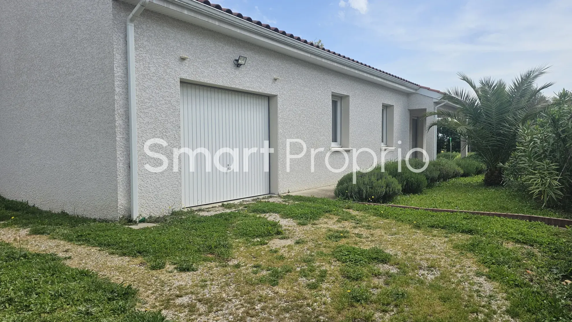 Maison de plain-pied récente à Chanas avec terrasse et garage