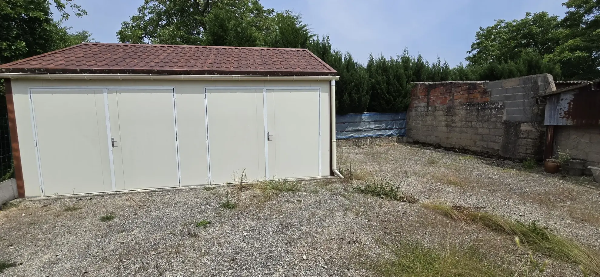 Maison à vendre à Ouzouer le Marché avec jardin et double garage 