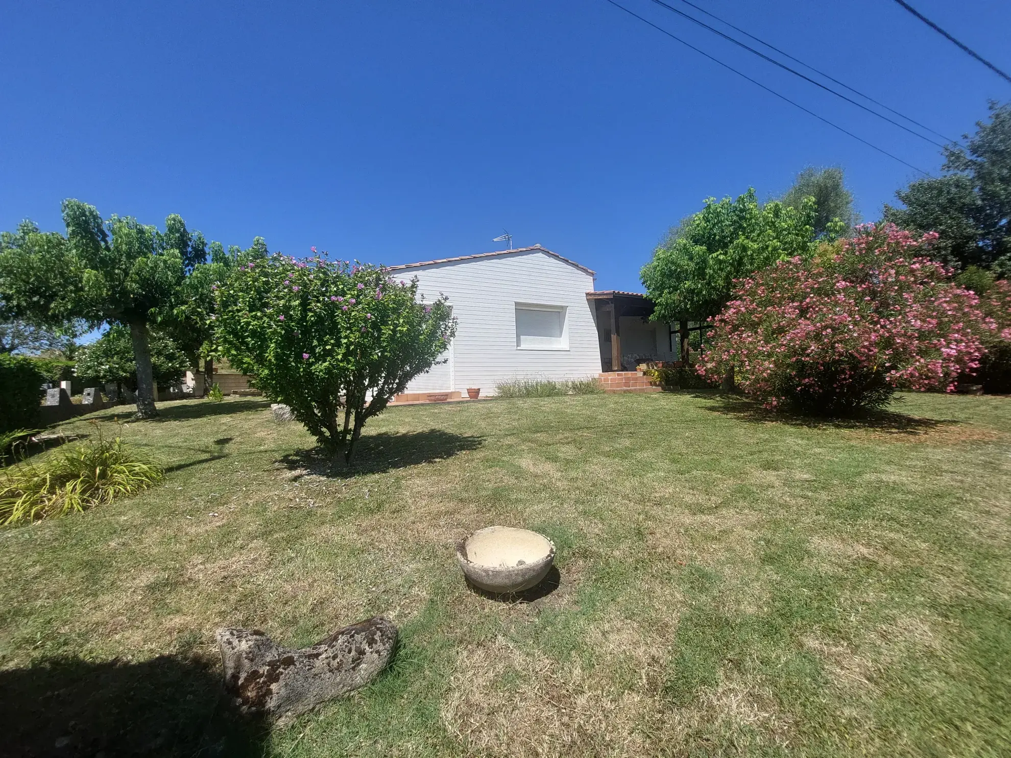 Maison de plain-pied de 97 m² avec garage et jardin à La Réole 