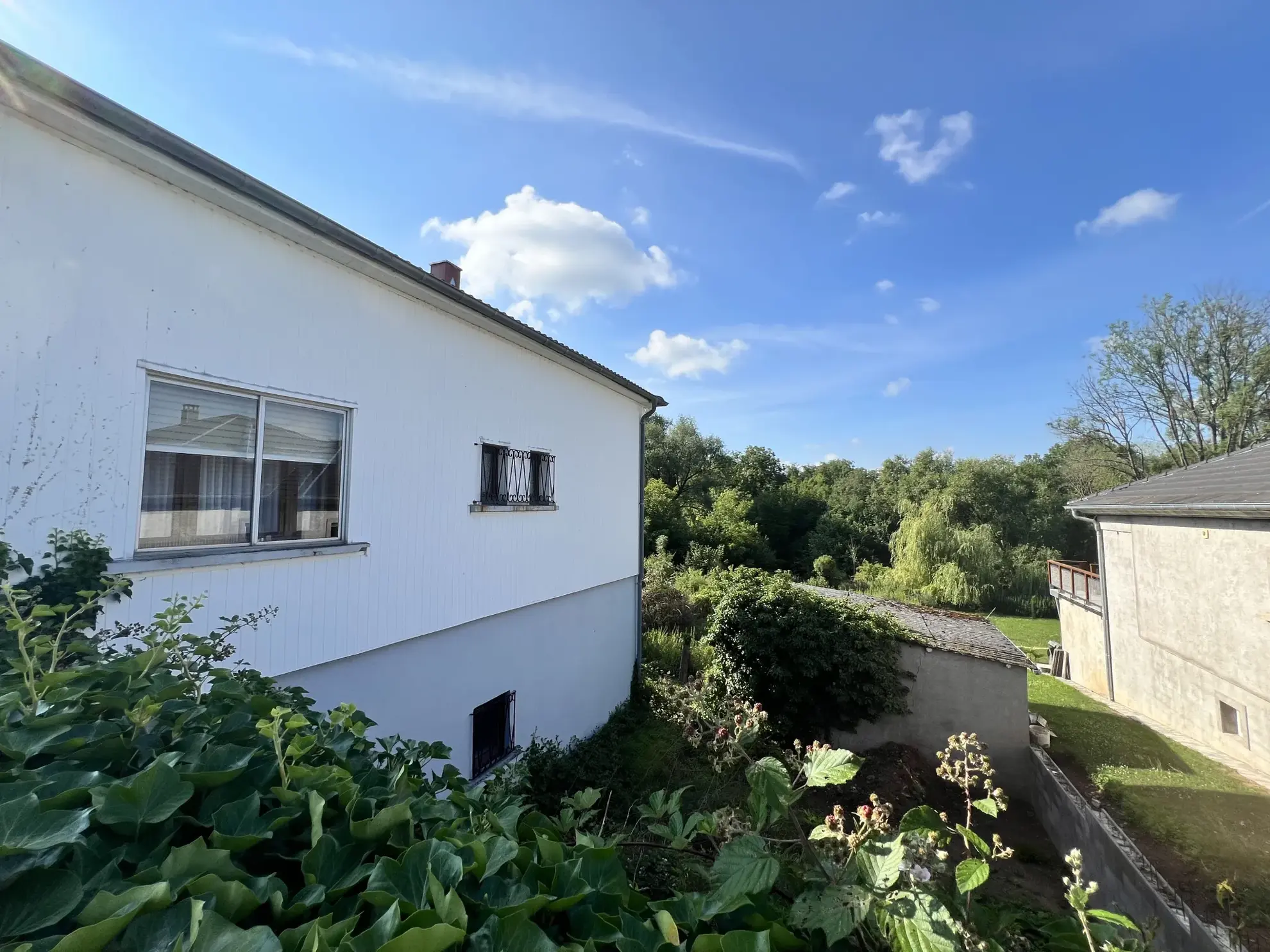 Maison individuelle à vendre à Berviller-en-Moselle avec sous-sol, terrasse et terrain spacieux 