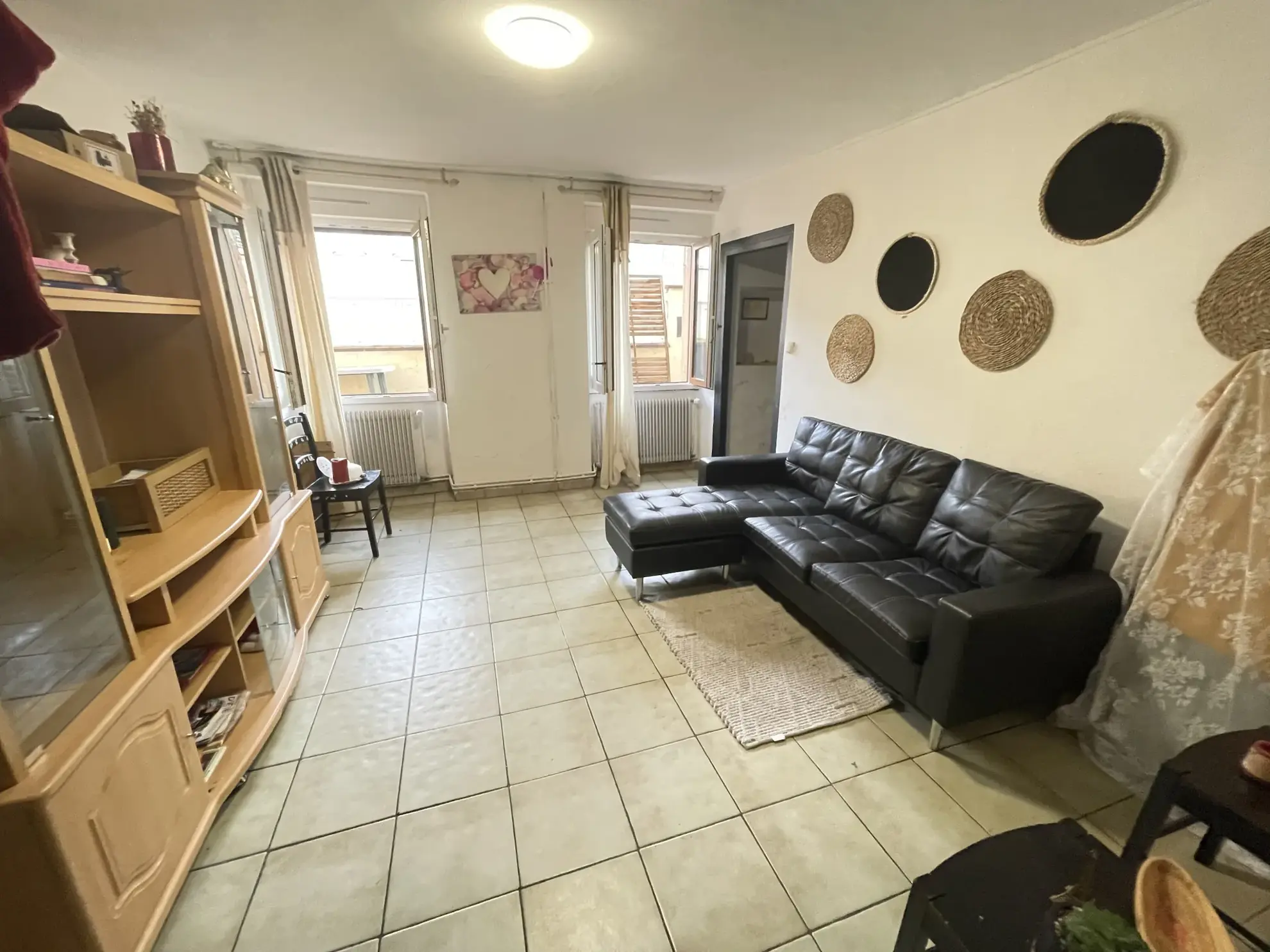 Appartement F3 de 82 m² avec cour privée à Mulhouse, proximité centre-ville