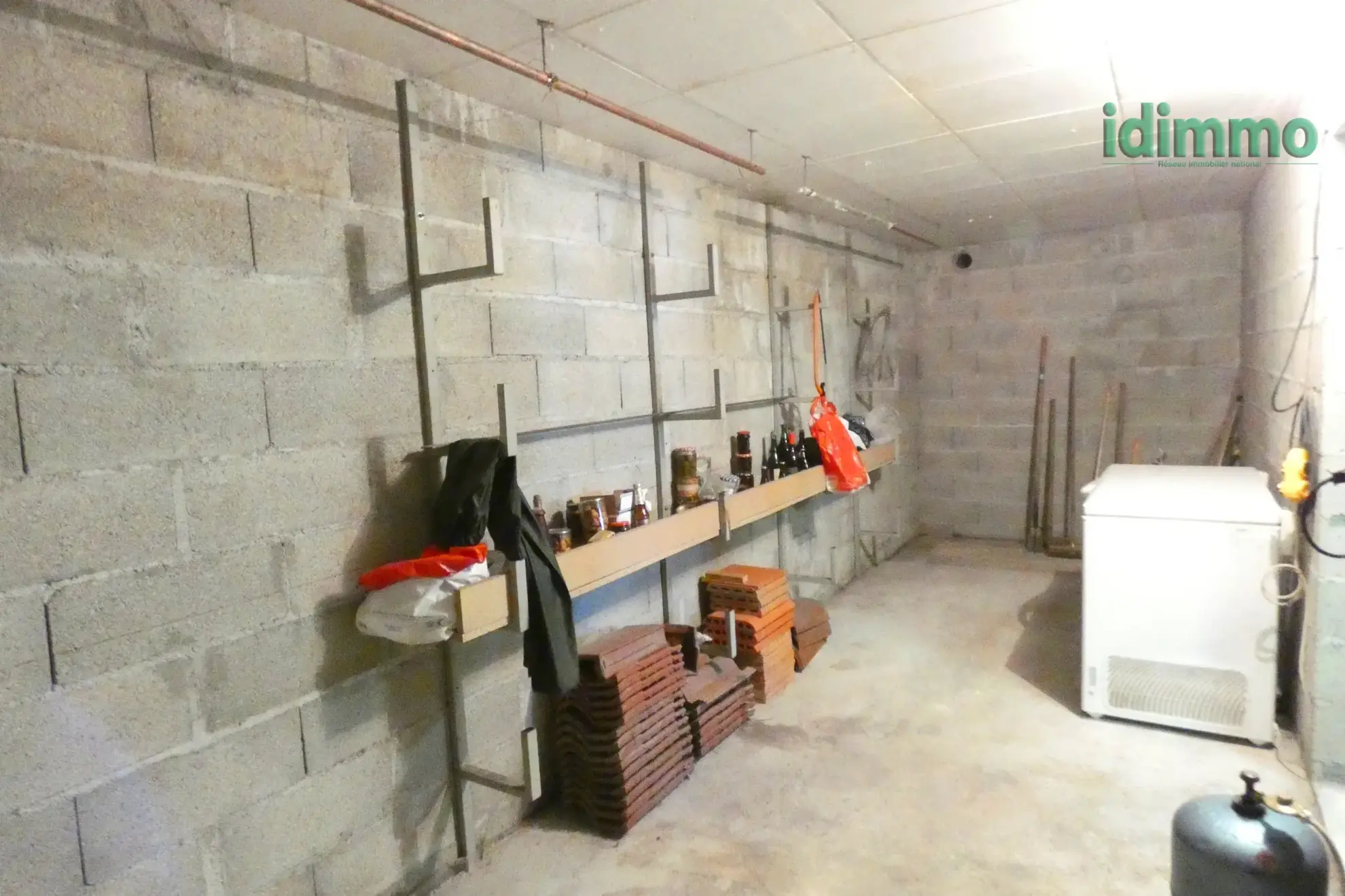 Maison de plain-pied à Aurillac proche centre-ville avec garage et grand terrain 