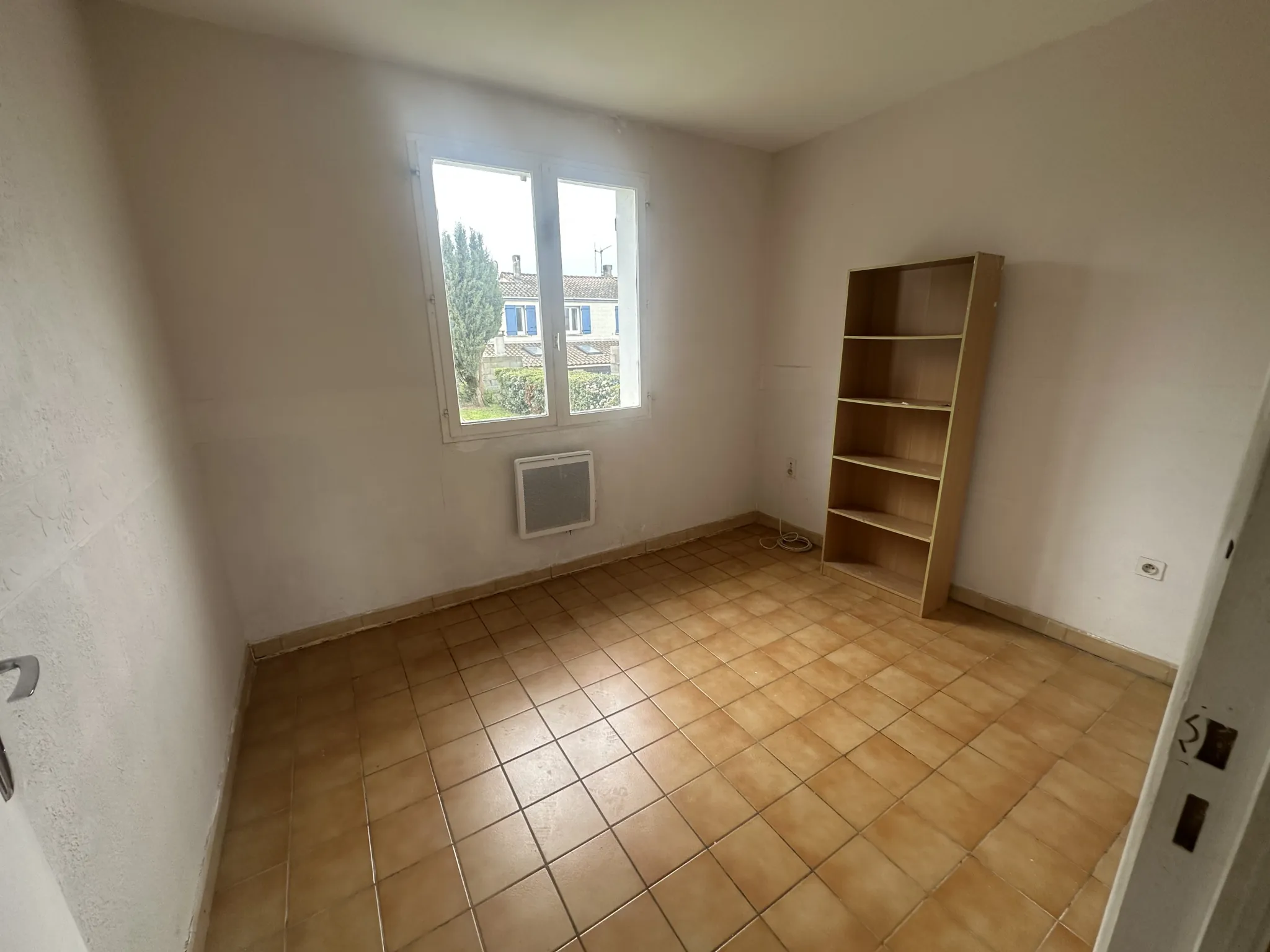 Maison à rénover à Carcassonne avec jardin et garage - Opportunité immobilière 