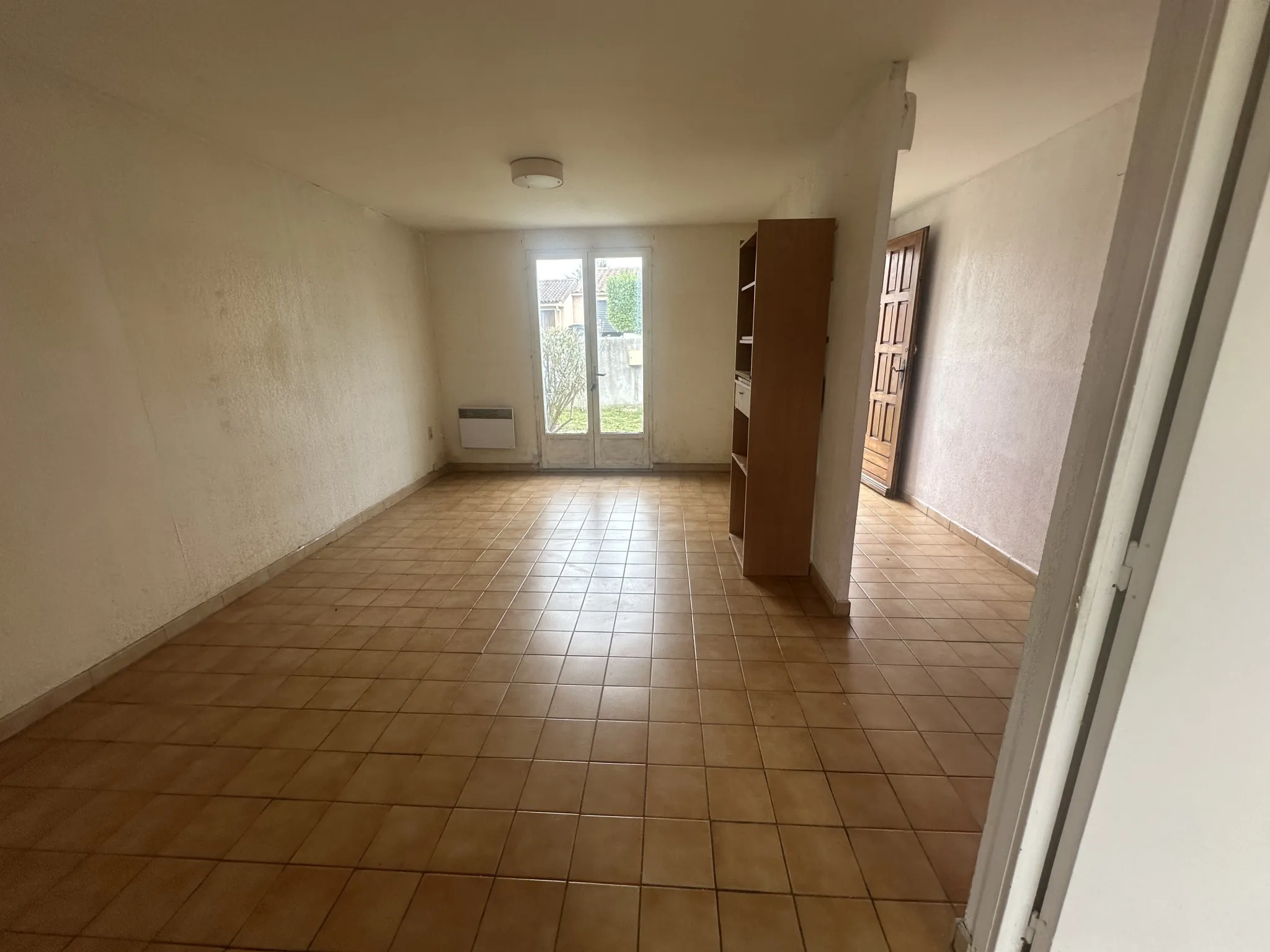 Maison à rénover à Carcassonne avec jardin et garage - Opportunité immobilière 