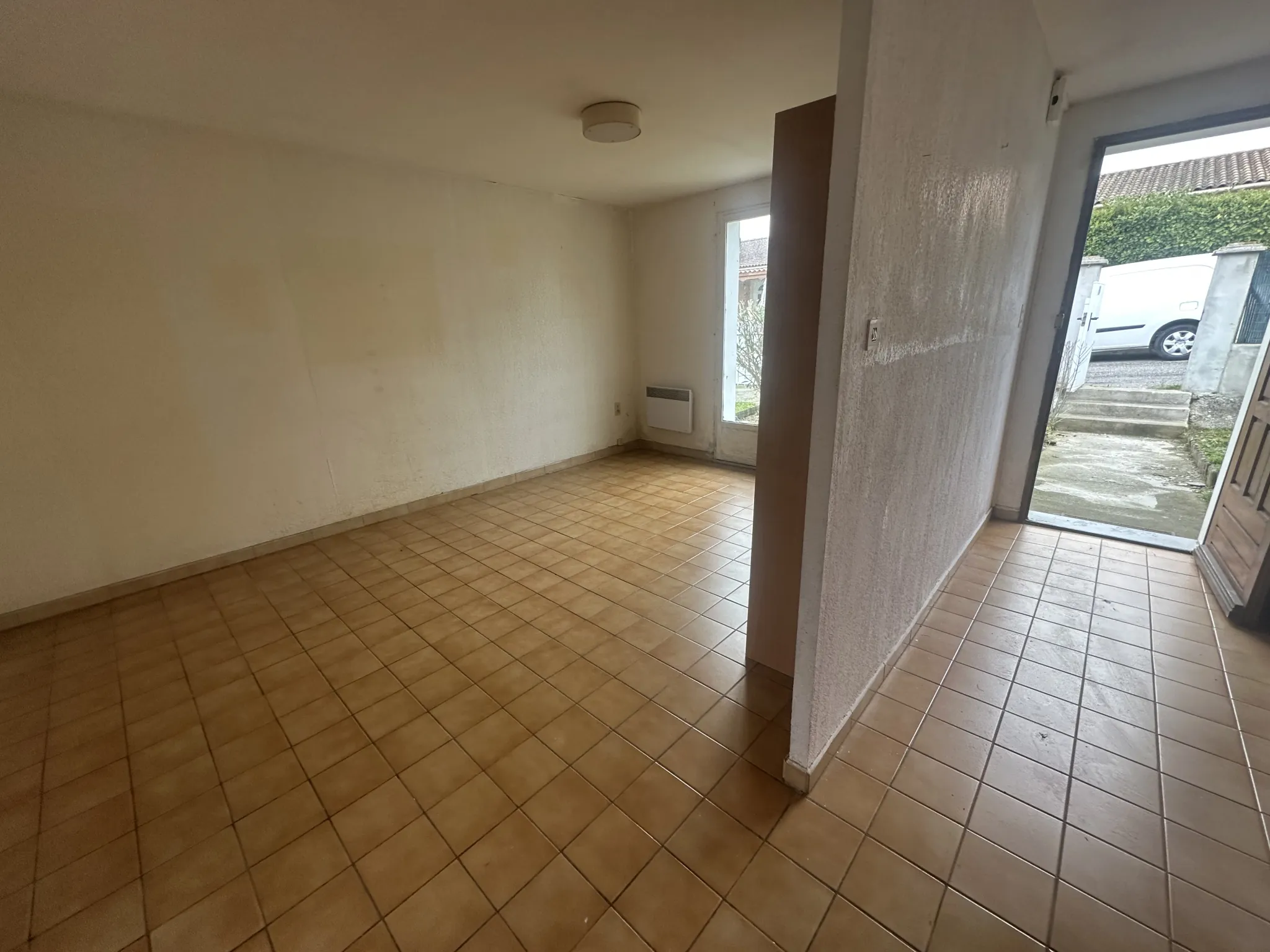 Maison à rénover à Carcassonne avec jardin et garage - Opportunité immobilière 