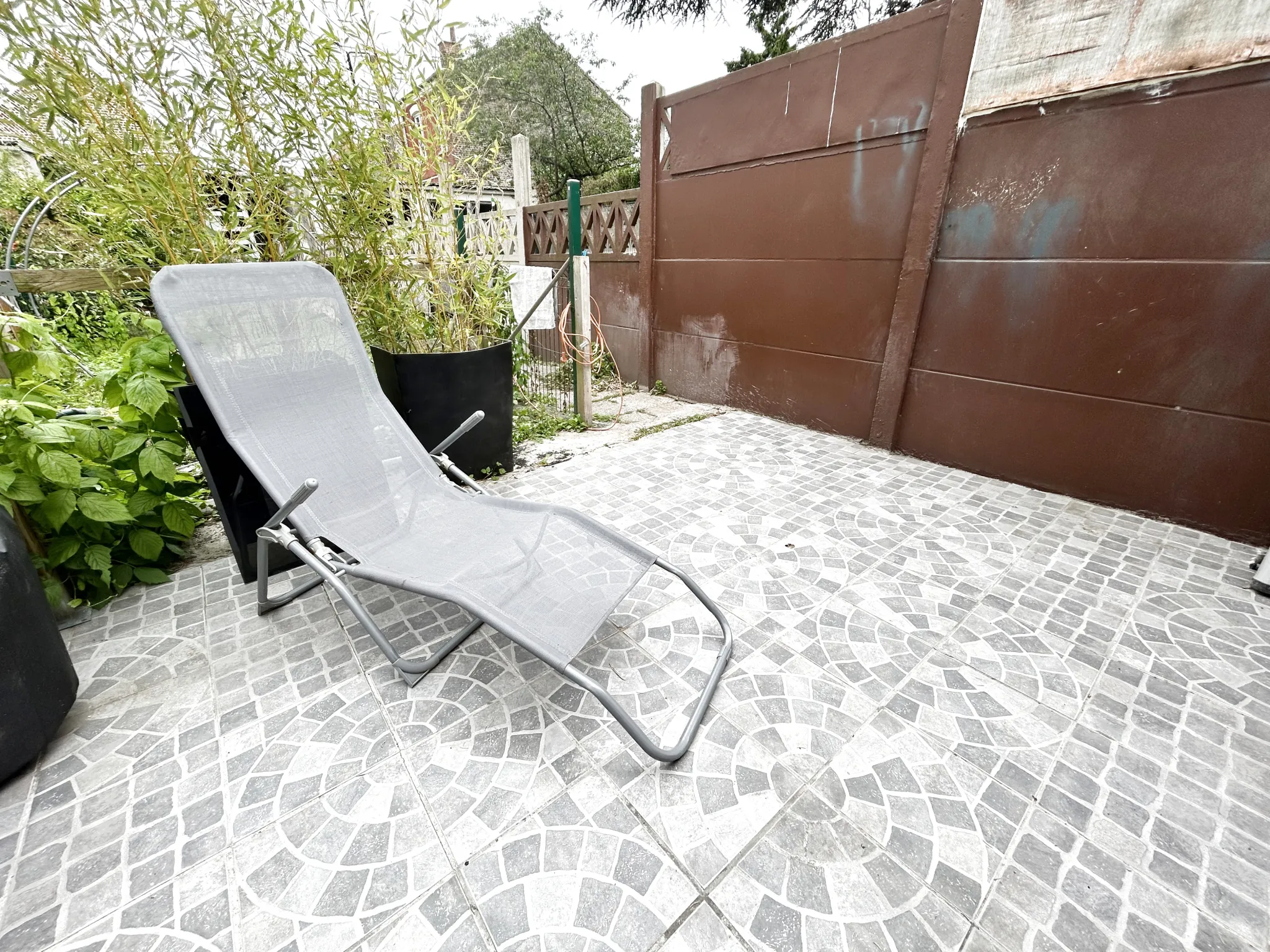 Maison de ville à vendre à Henin Beaumont proche gare et centre, jardin et garage 