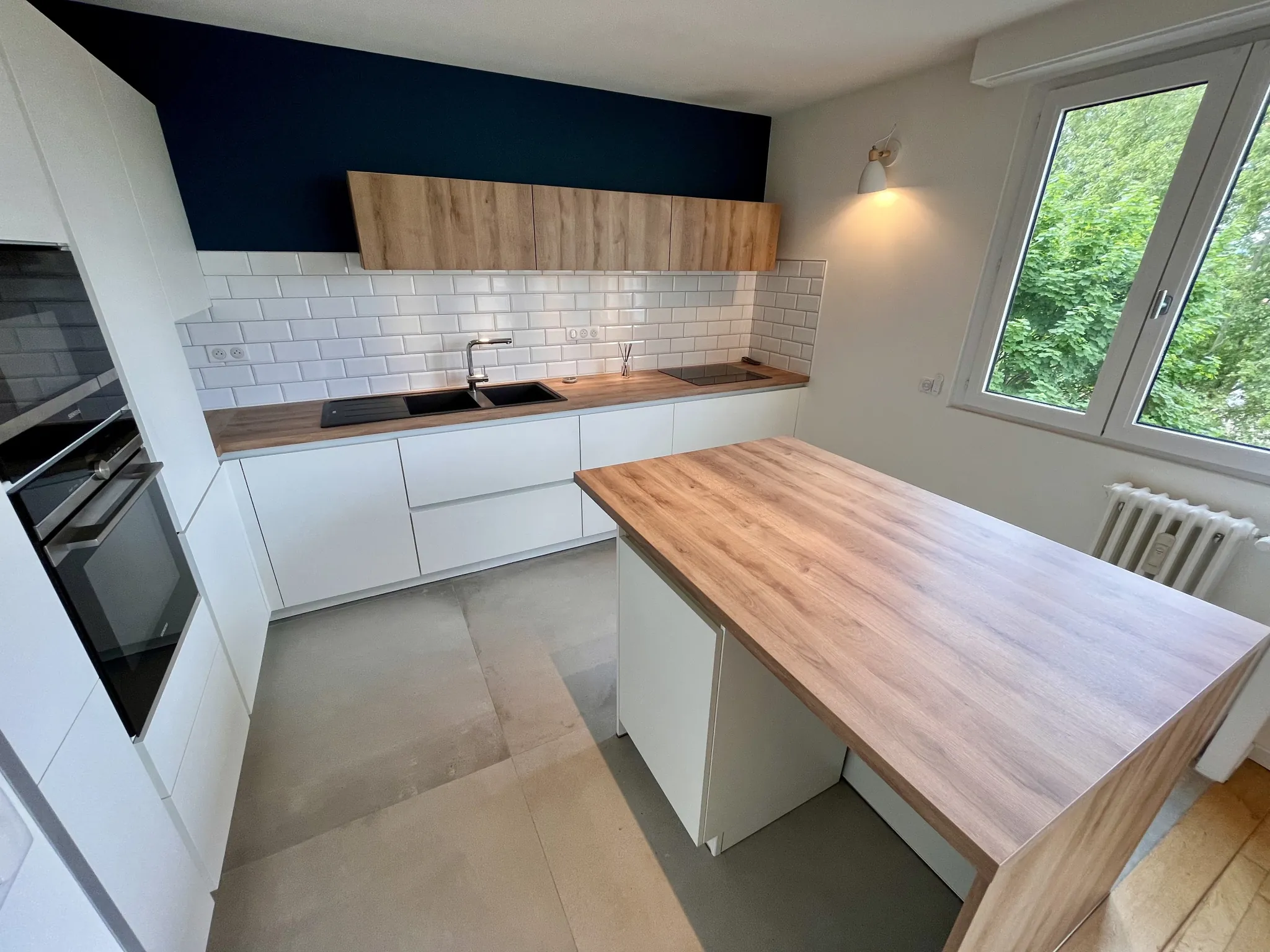 Appartement de type 4 rénové avec balcon et garage à Dijon Centre-ville 