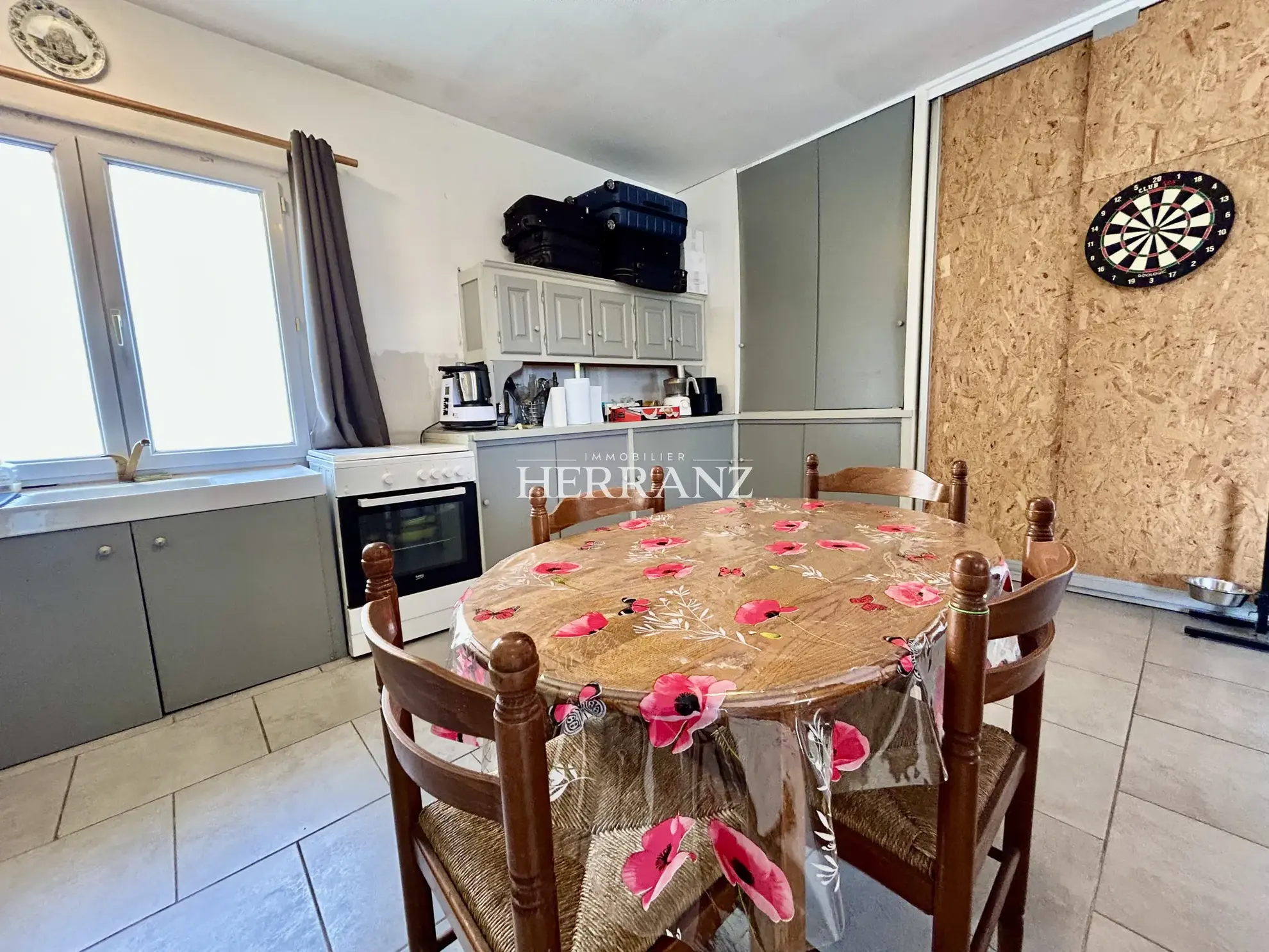 Charmante maison de plain-pied avec garage et jardin clos à Saint Denis de Pile 