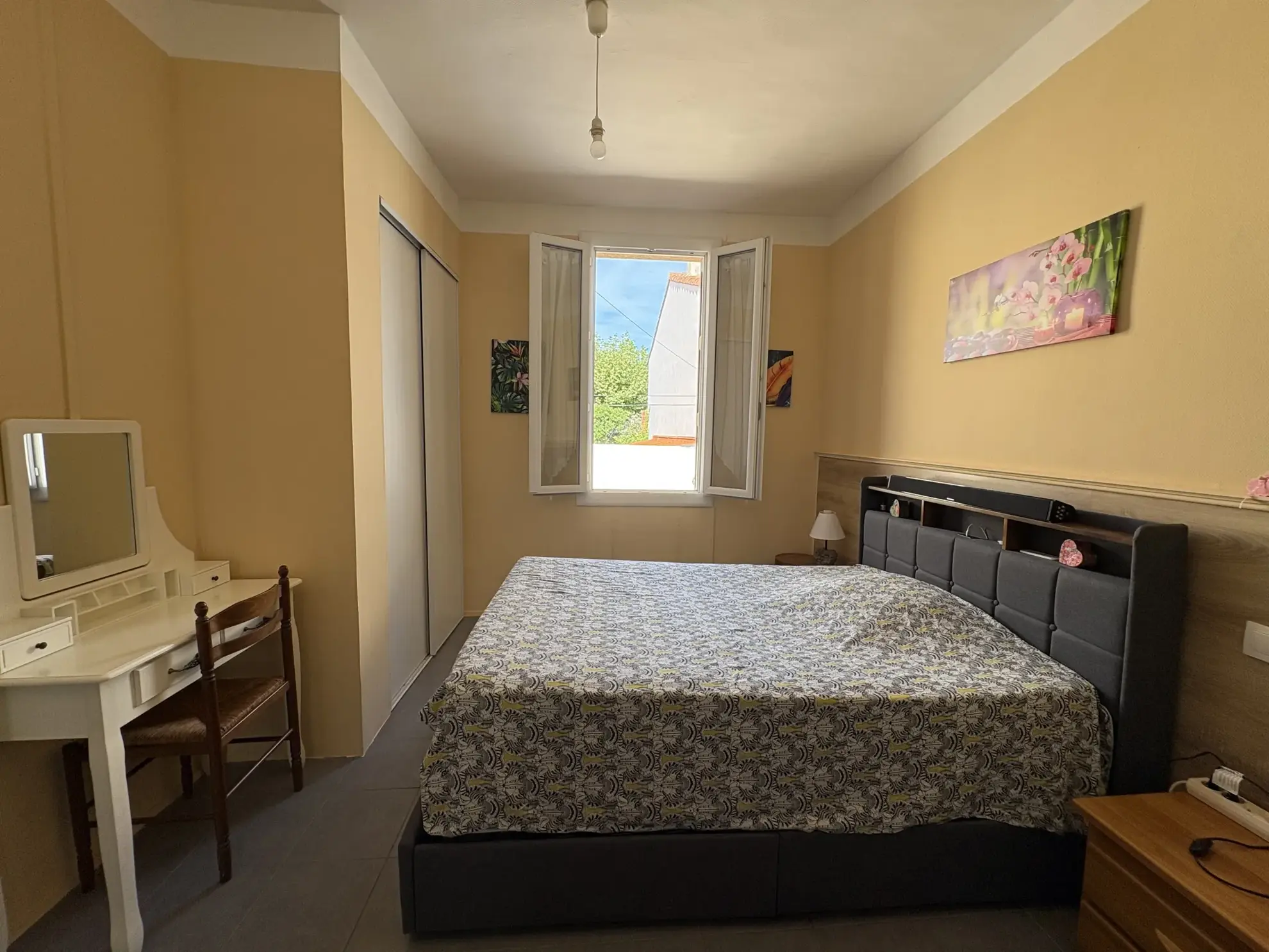 Maison de ville à Thuir de 102 m² avec jardin et annexes 