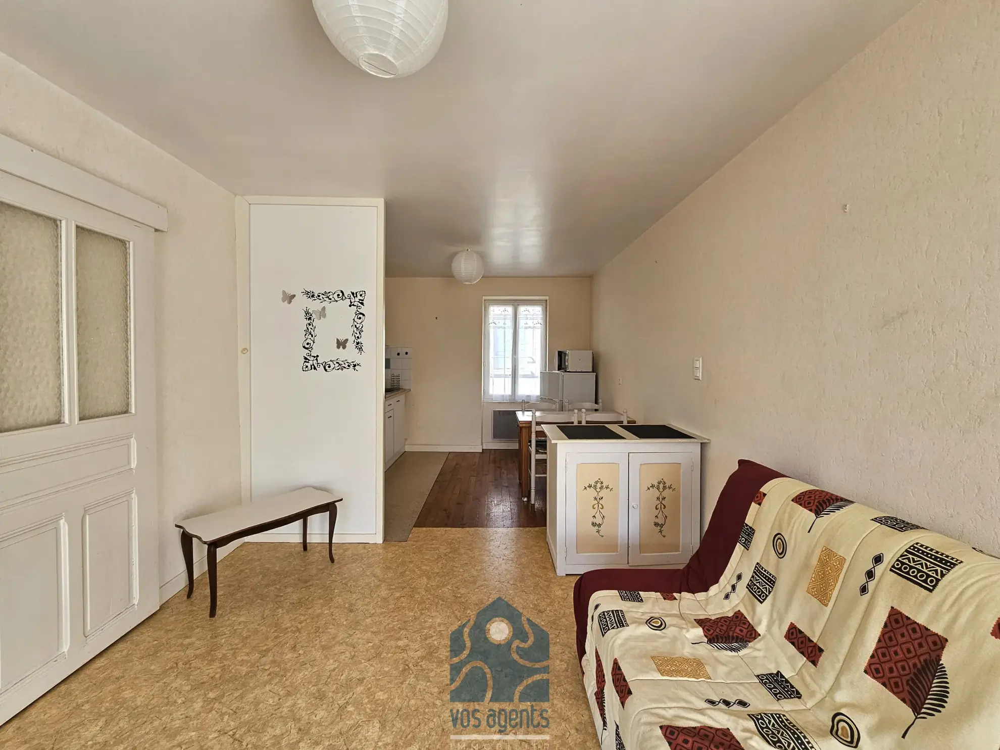 Maison de village divisée en deux logements avec cave, garage et cour à Saint-Gervais d'Auvergne 